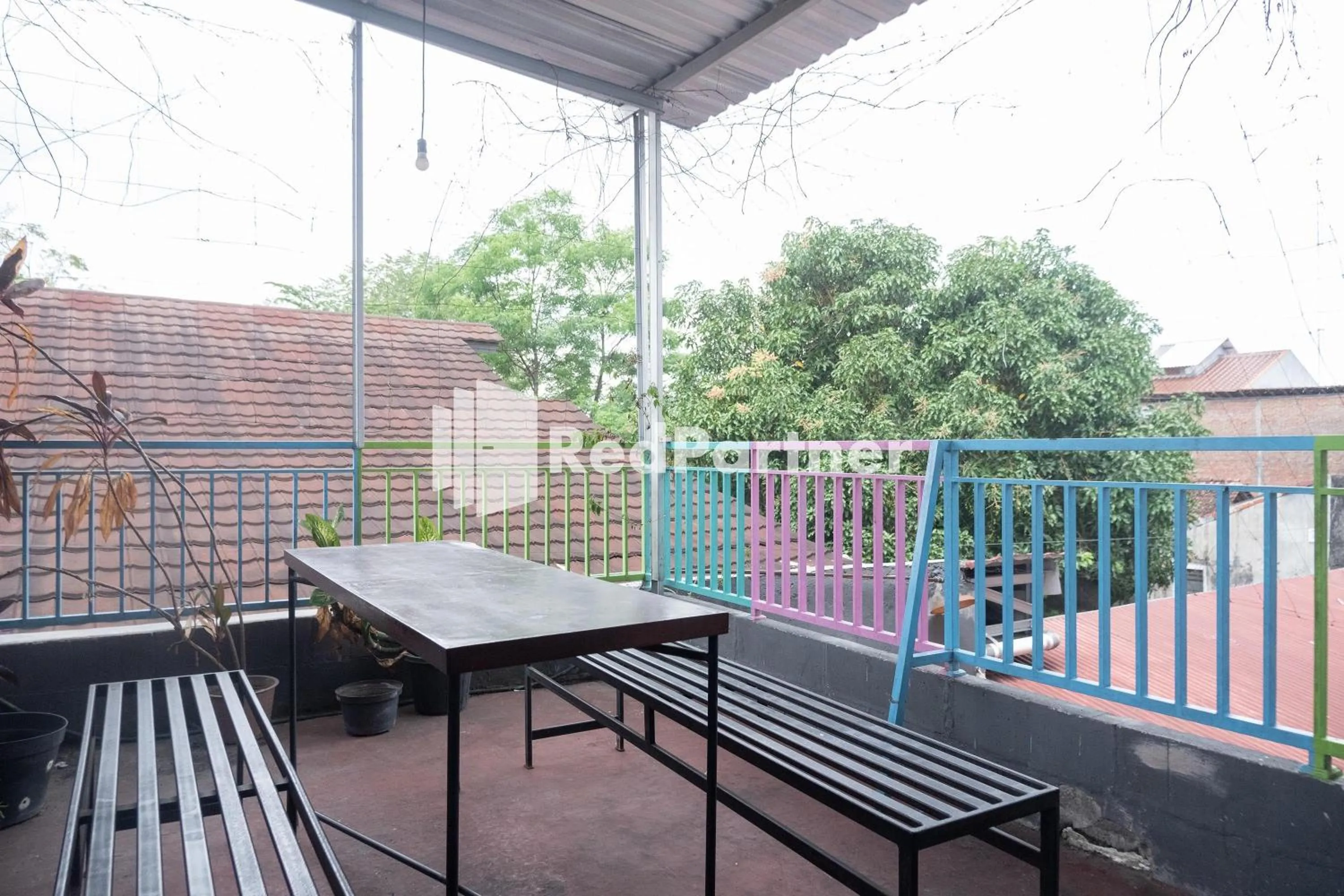 Balcony/Terrace in Athaya Hotel Syariah near UGM Yogyakarta Mitra RedDoorz