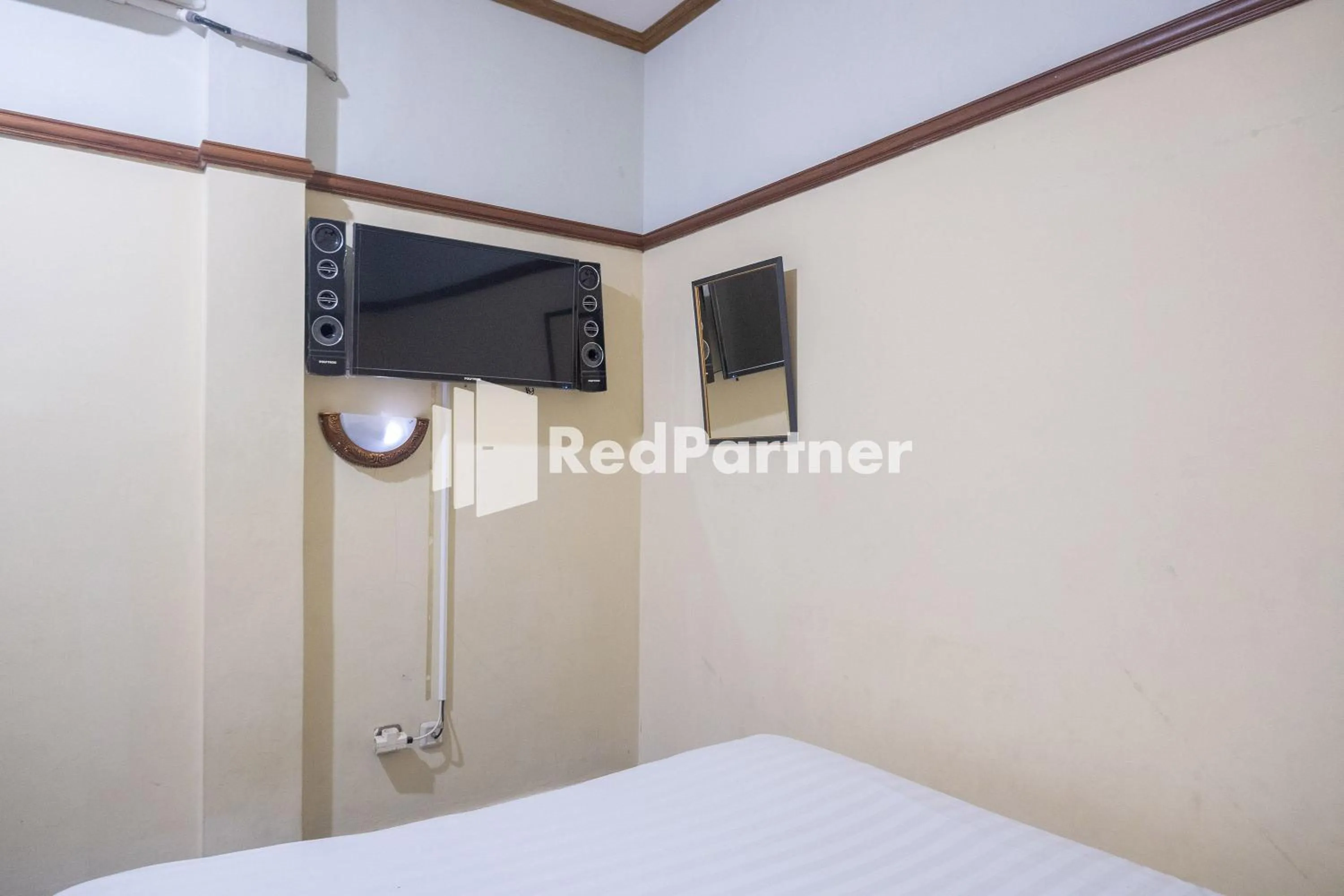 Bedroom, Bed in Athaya Hotel Syariah near UGM Yogyakarta Mitra RedDoorz