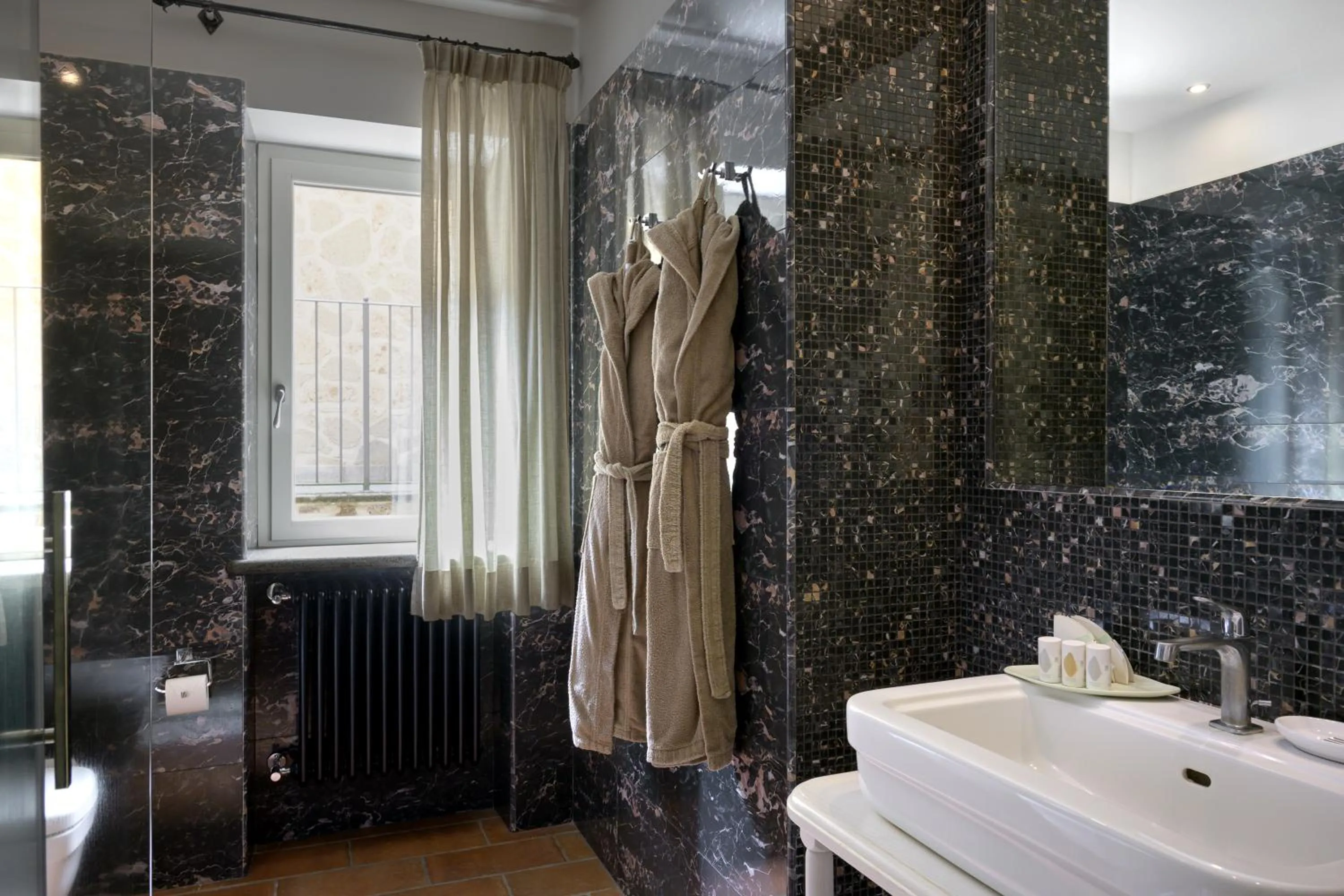 Shower in Altarocca Wine Resort Adults Only