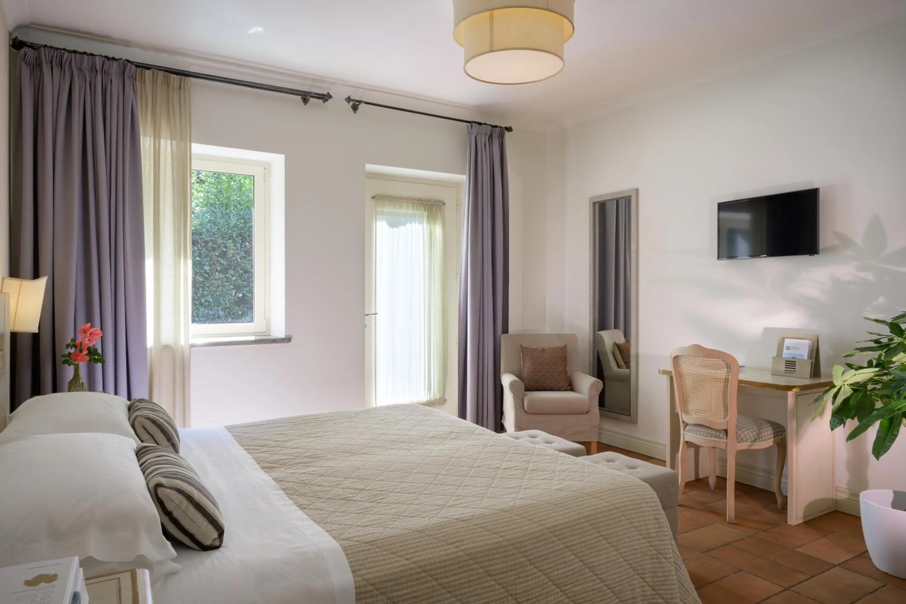 Photo of the whole room, Bed in Altarocca Wine Resort Adults Only