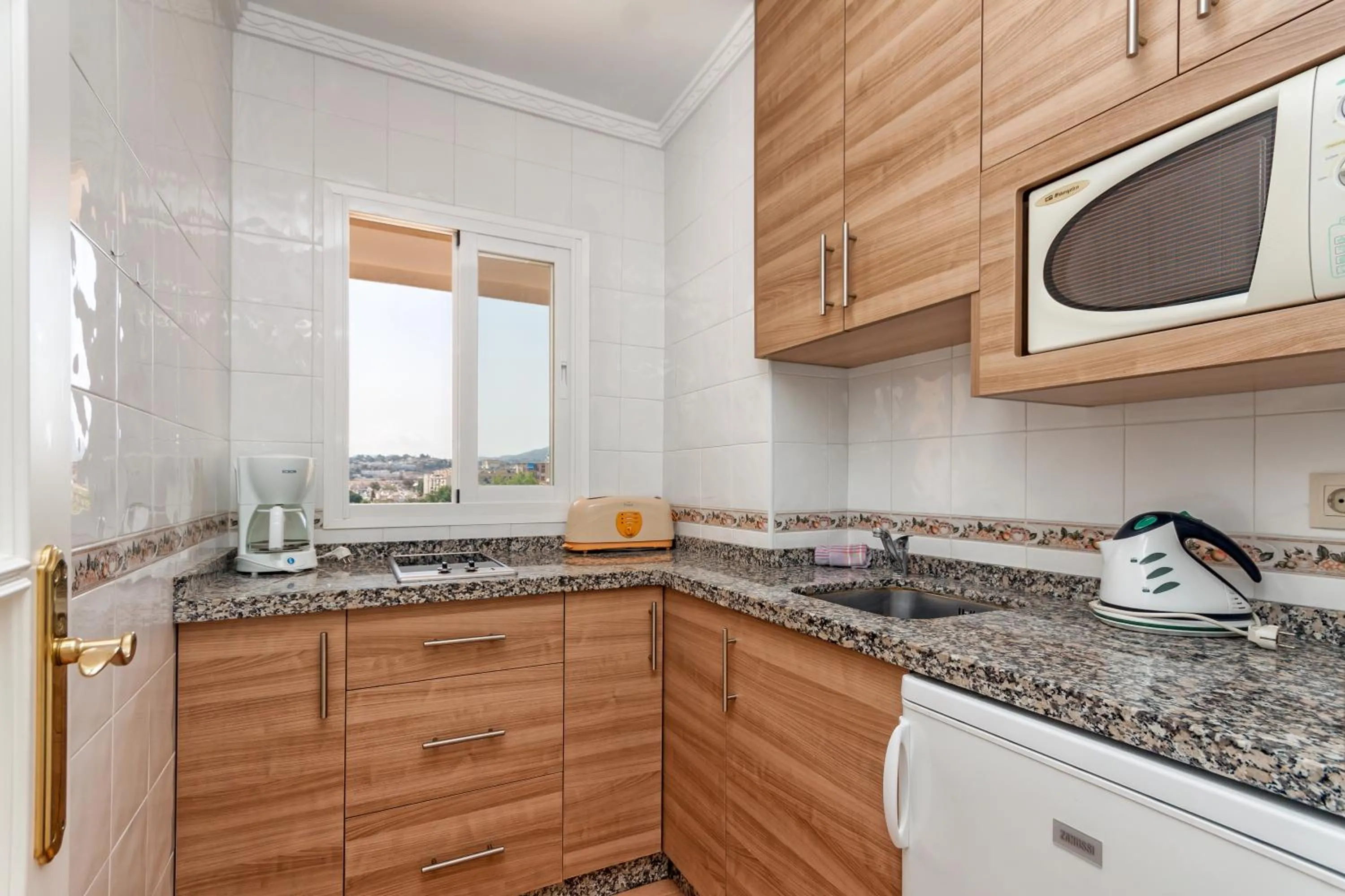 Kitchen or kitchenette in Apartamentos Stella Maris - Marcari SL