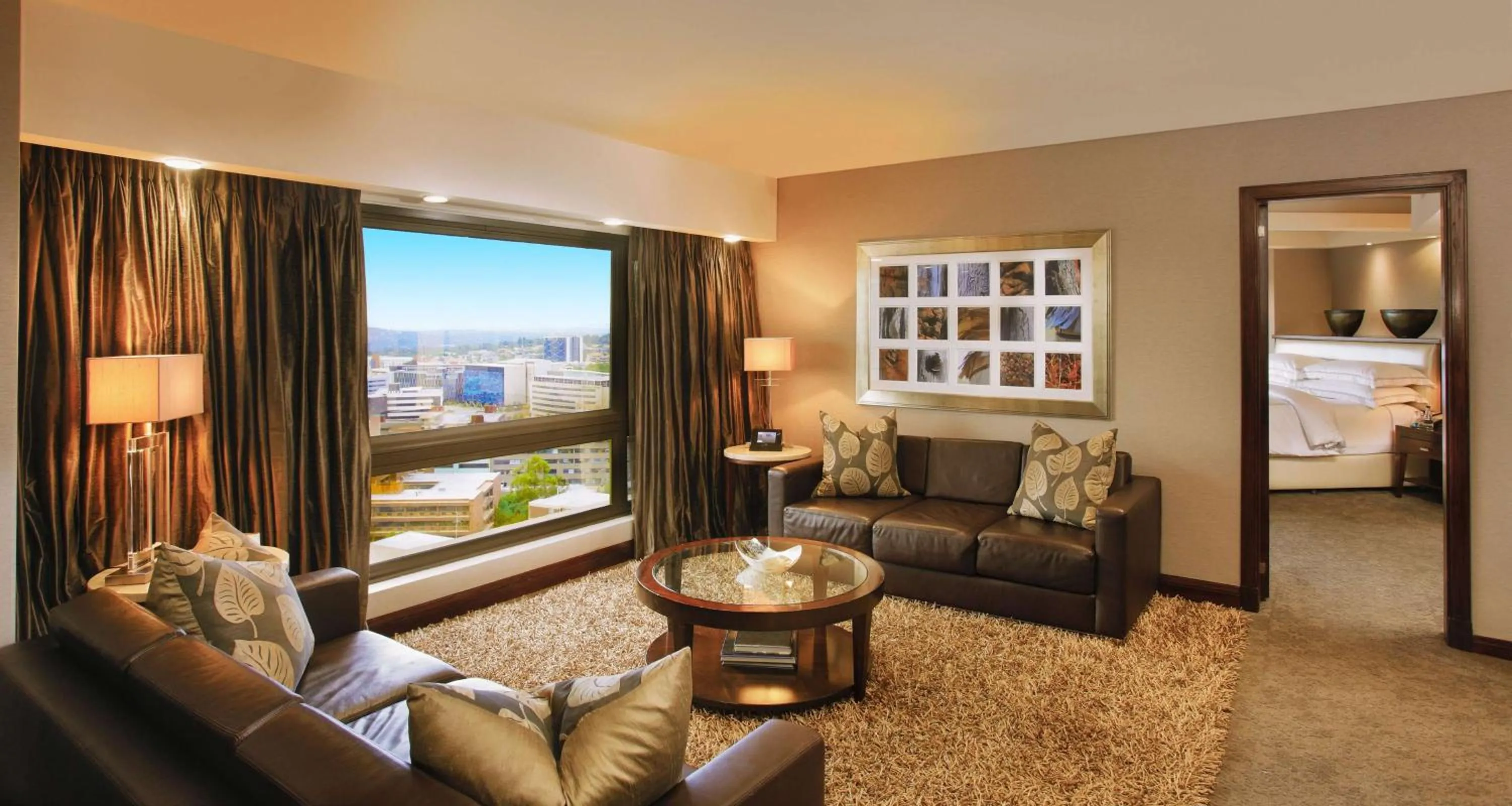 Photo of the whole room, Bed in Sandton Sun and Towers