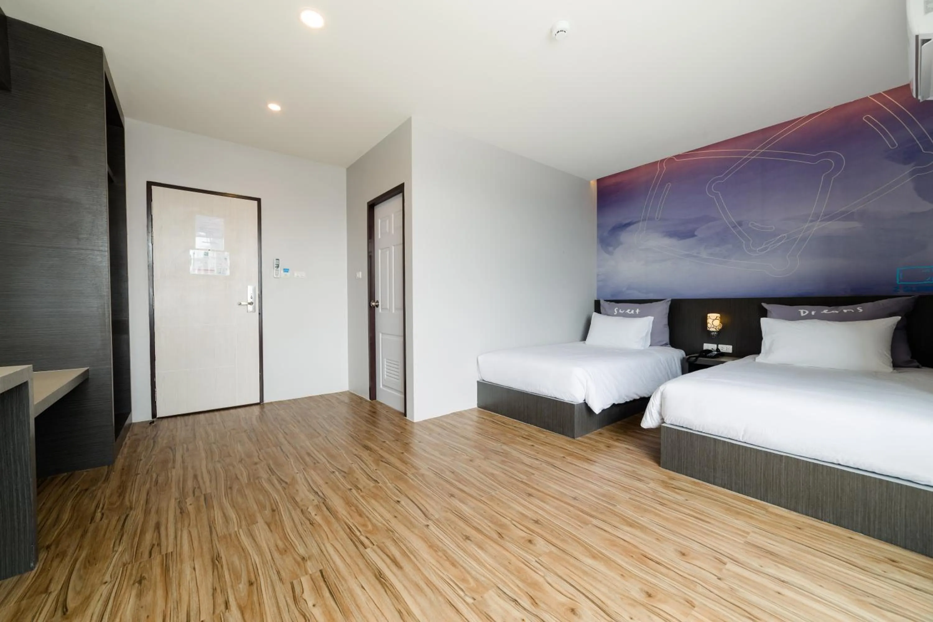 Bed in Z Sleep Hotel