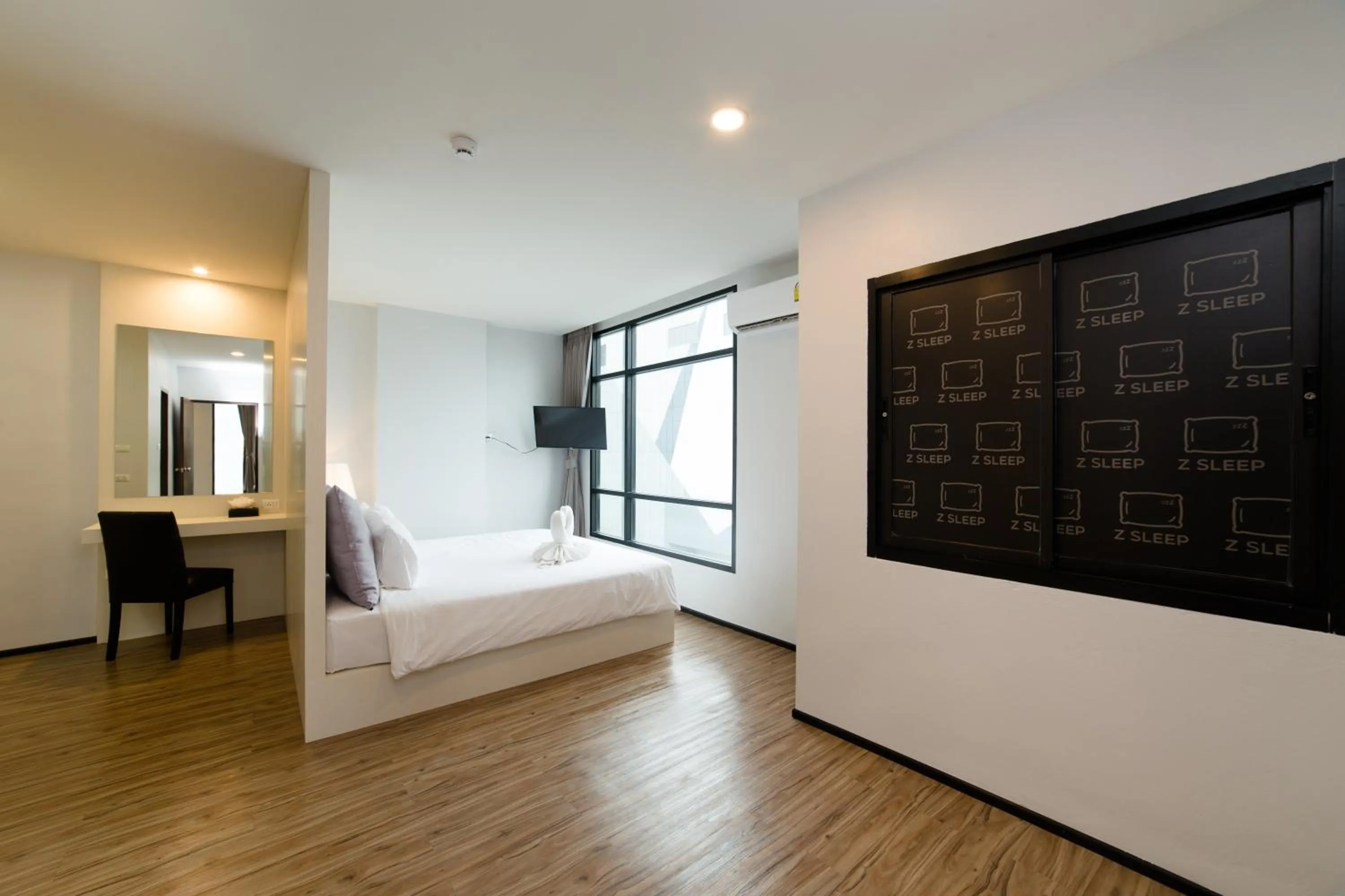 Bed in Z Sleep Hotel