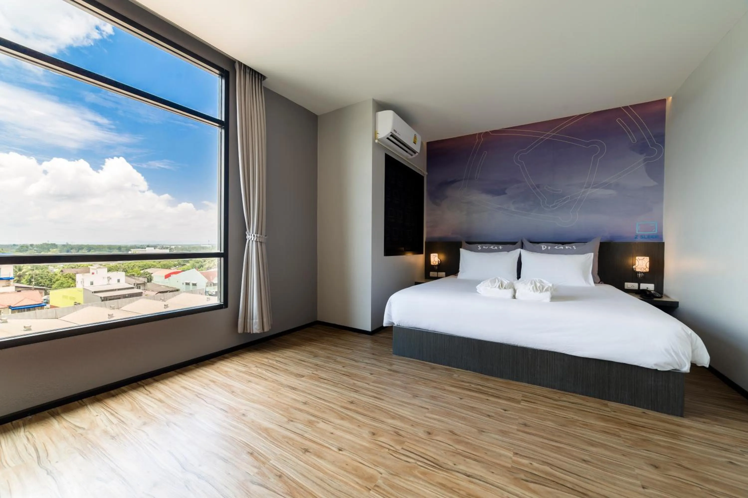 Bed in Z Sleep Hotel