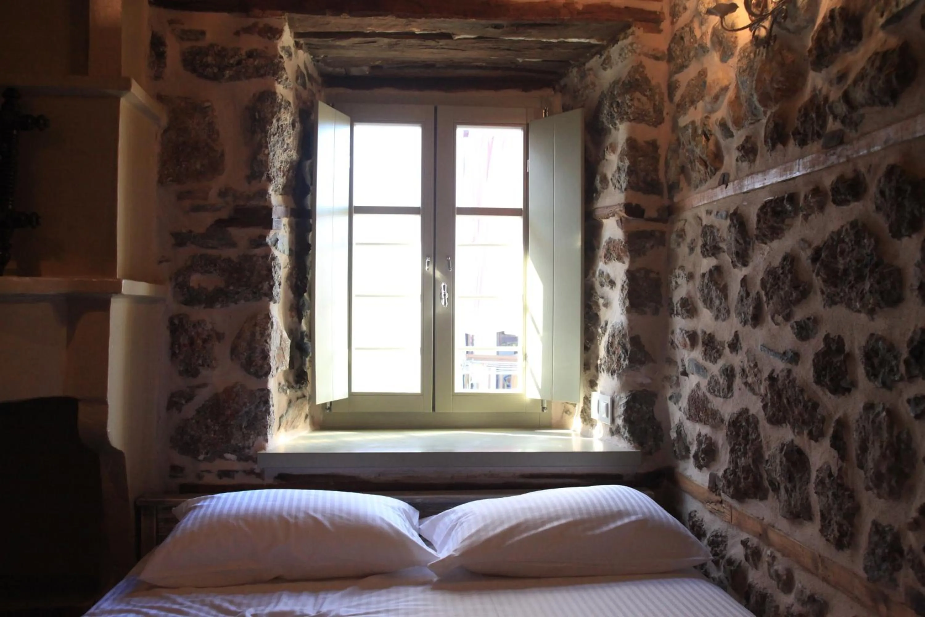 Bed in Bayiri Petit Pension