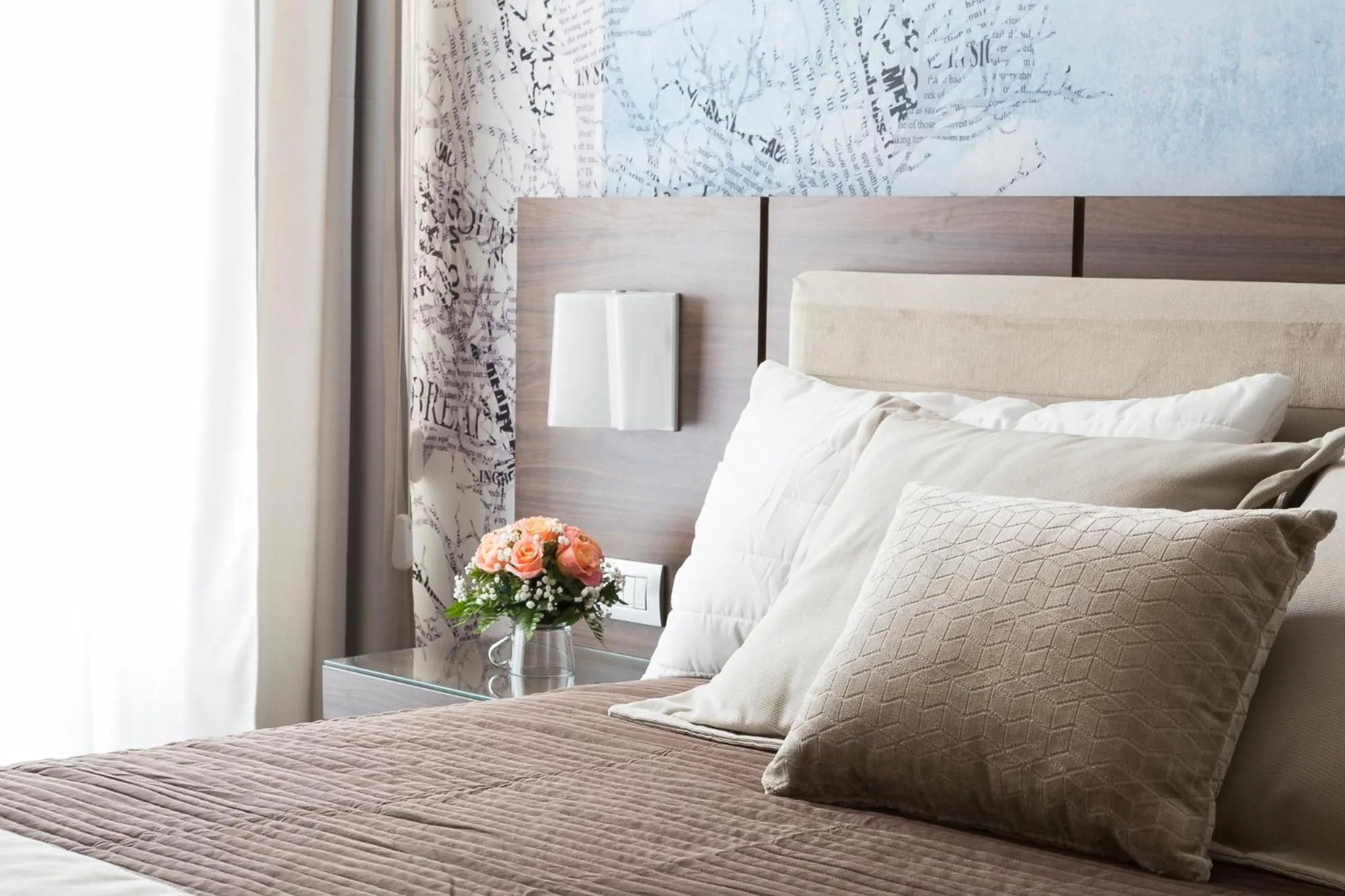 Bed in Rhome Suites