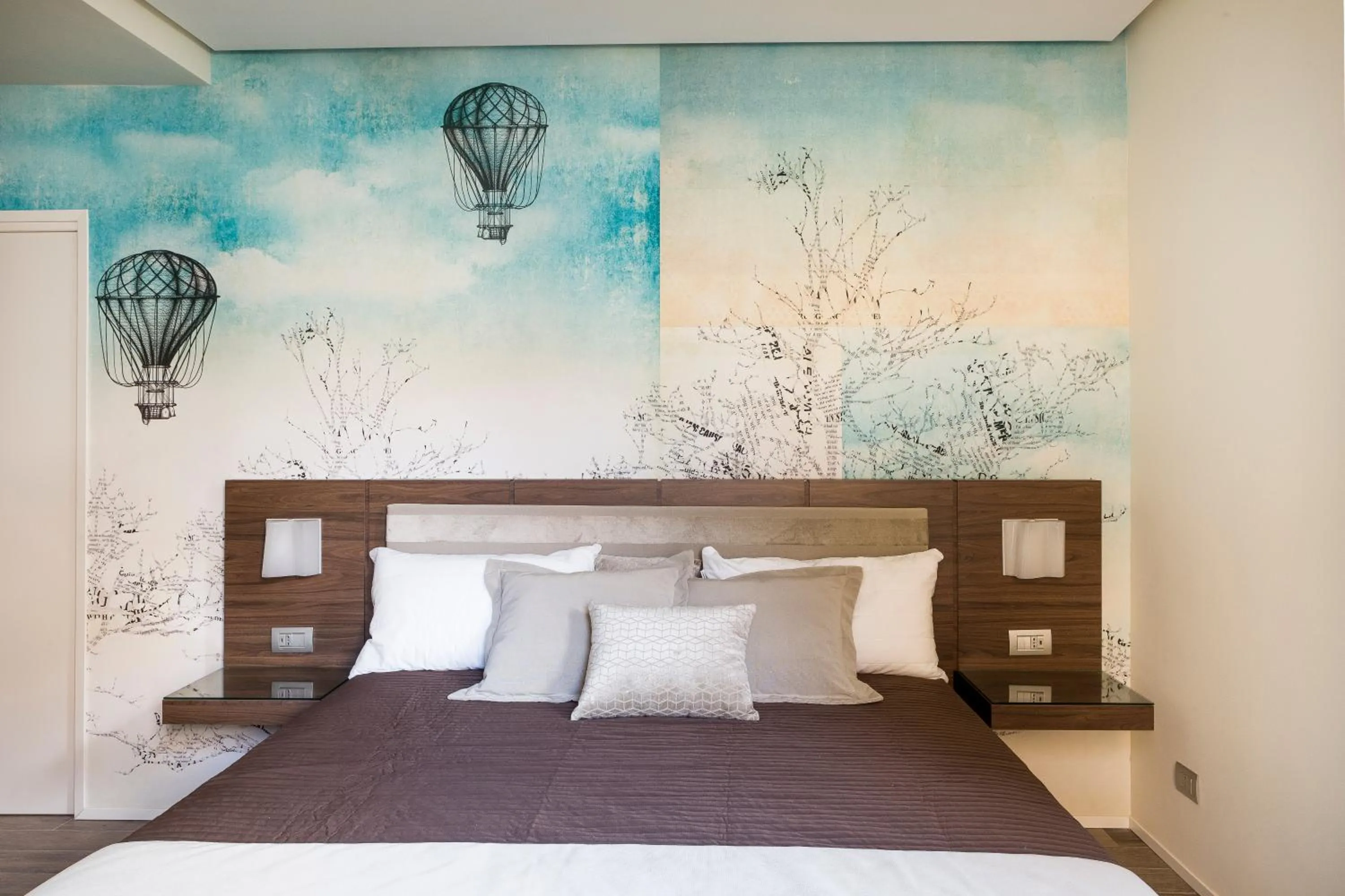 Bed in Rhome Suites