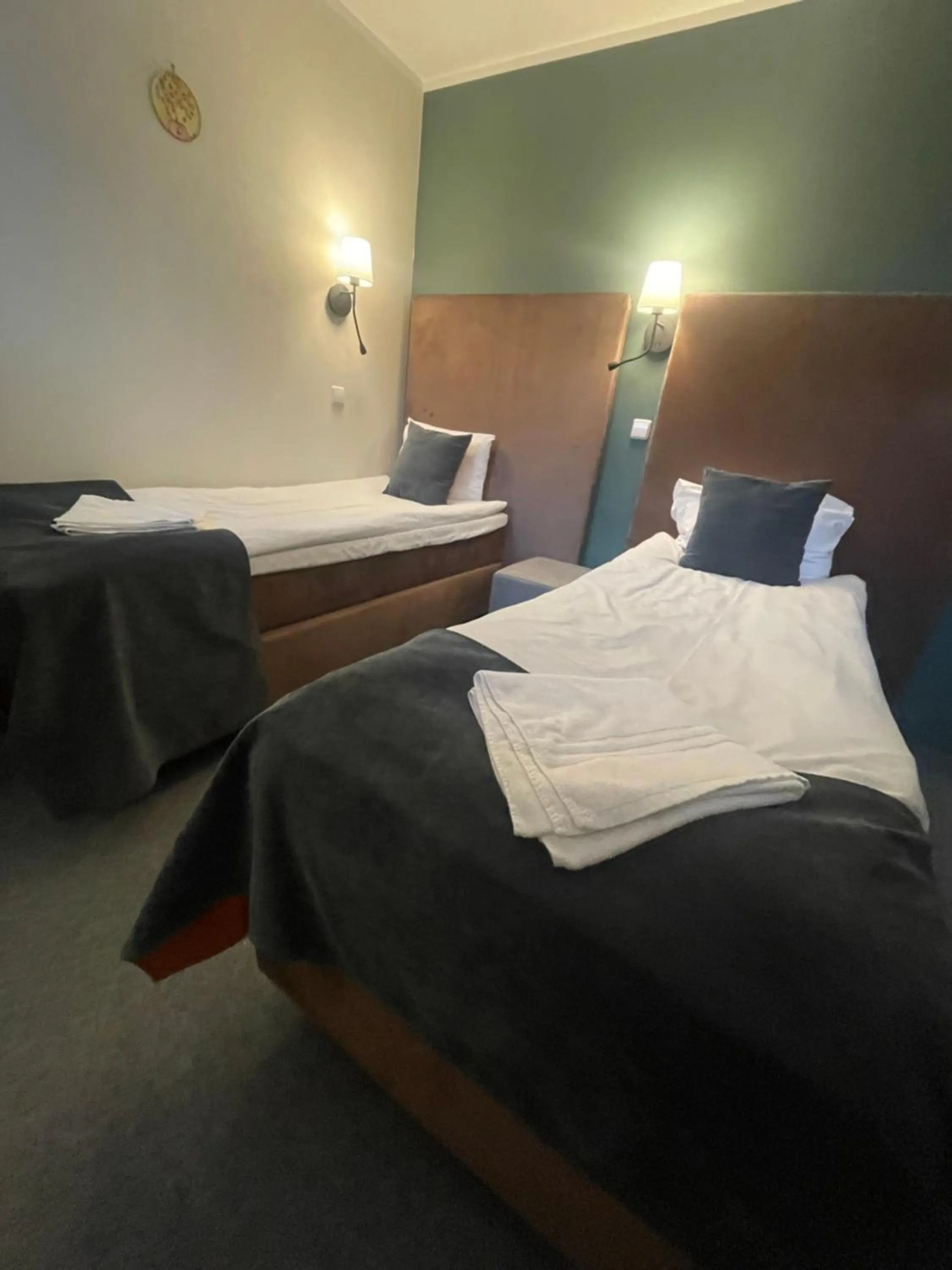 Bed in Apple Economy Hotel