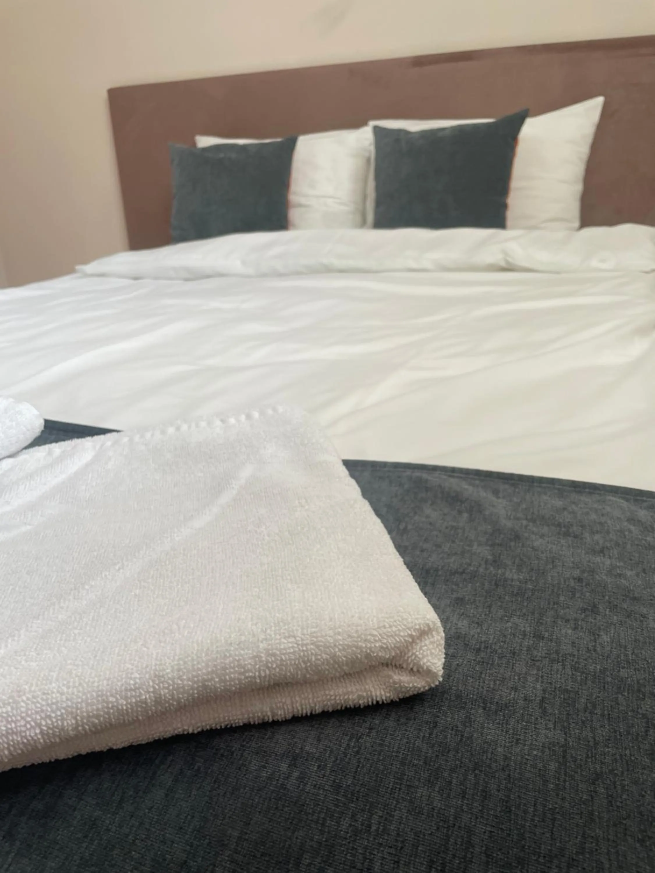 Bed in Apple Economy Hotel