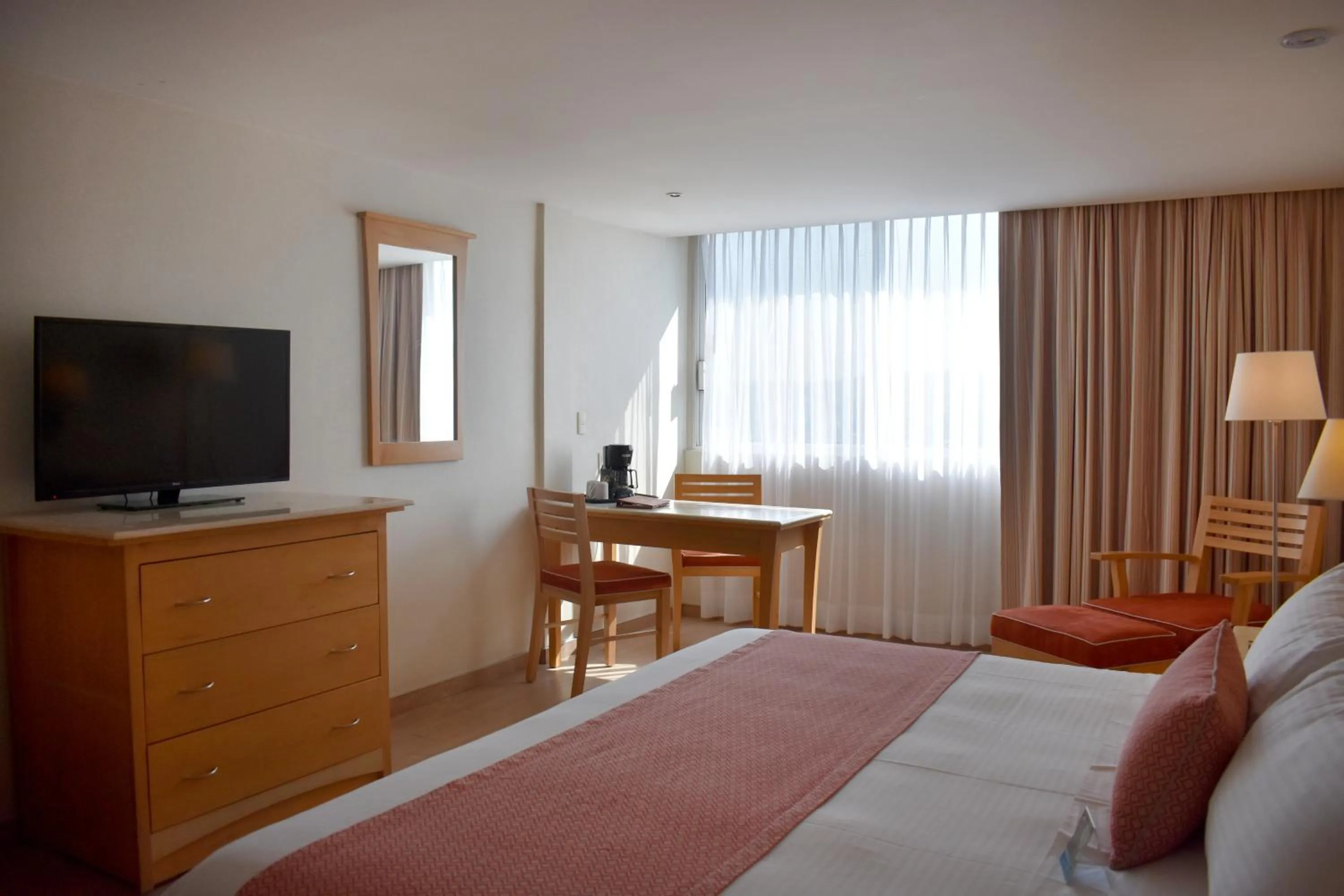 Photo of the whole room, Bed in Hotel Palacio Azteca Tijuana, Trademark by Wyndham