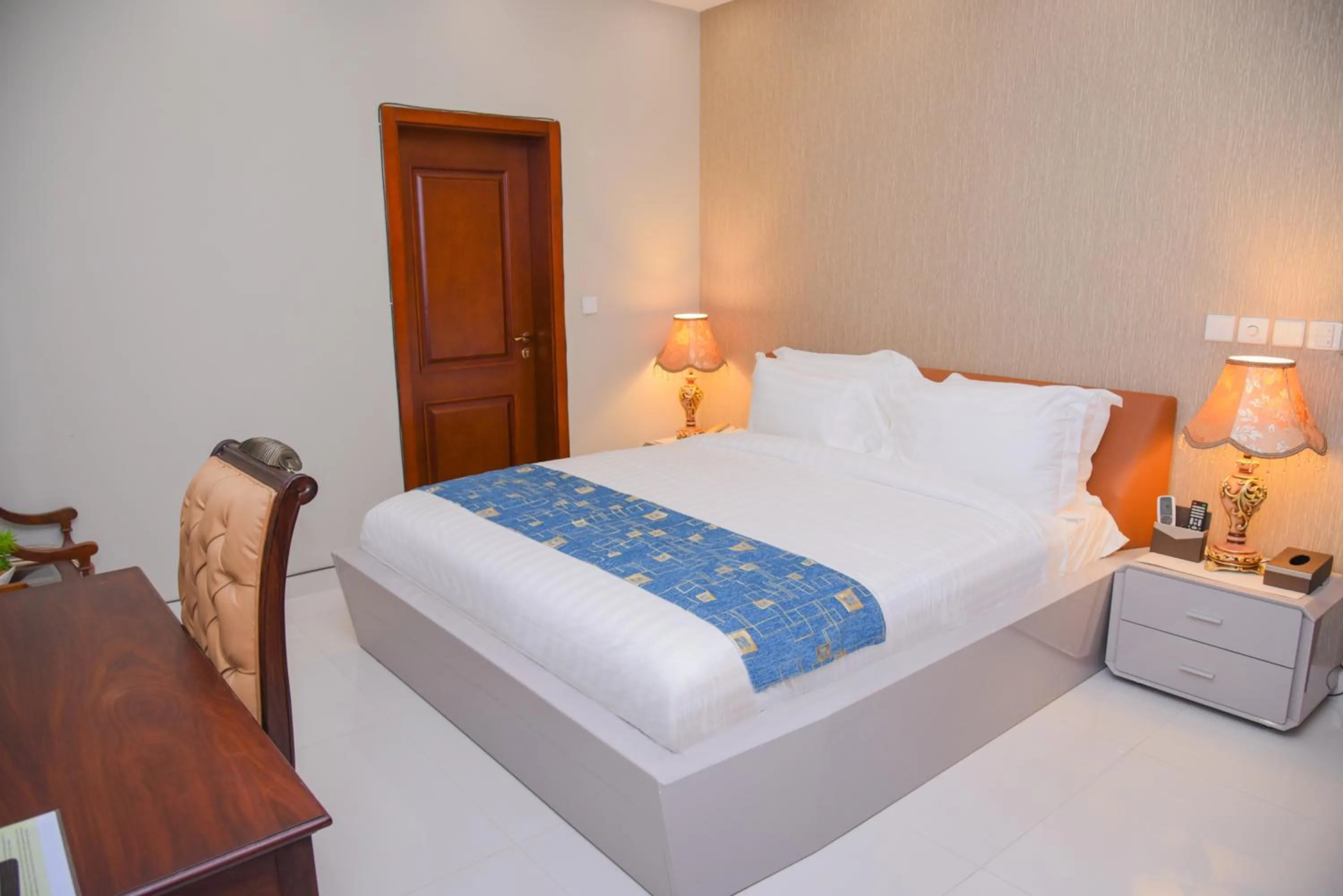 Bed in Orchards Cottage Hotel