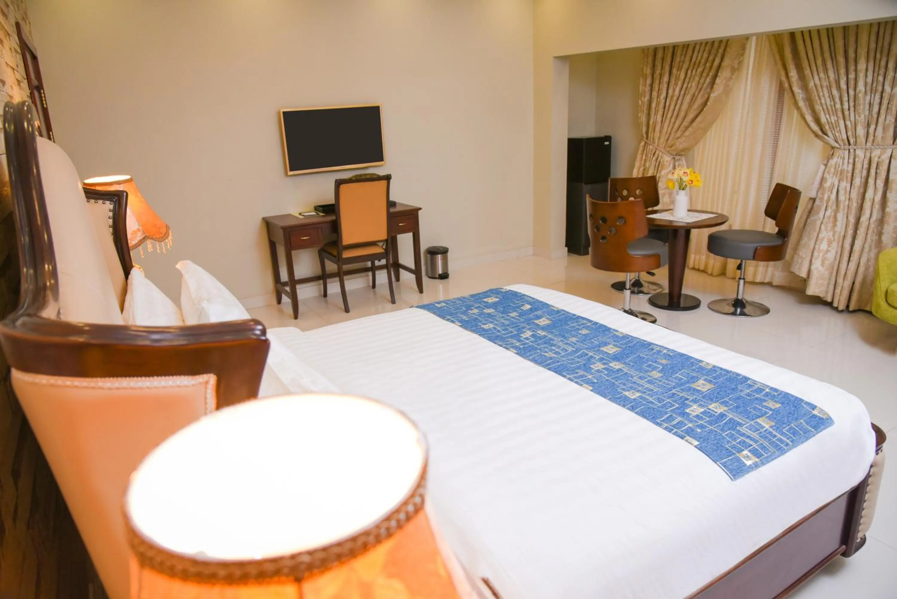 Bed in Orchards Cottage Hotel