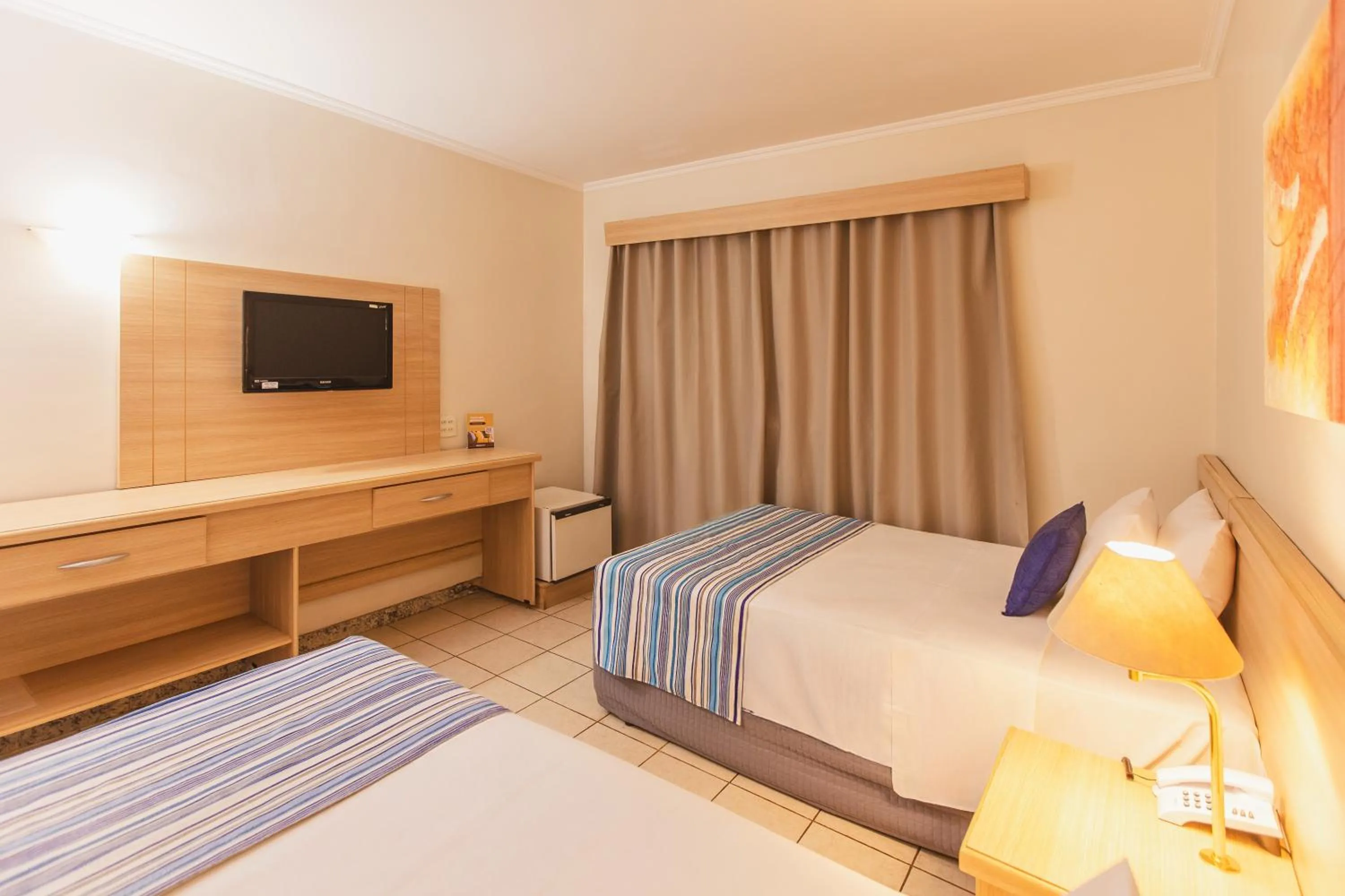 View (from property/room), Bed in Hotel Golden Park Ribeirão Preto by Nacional Inn