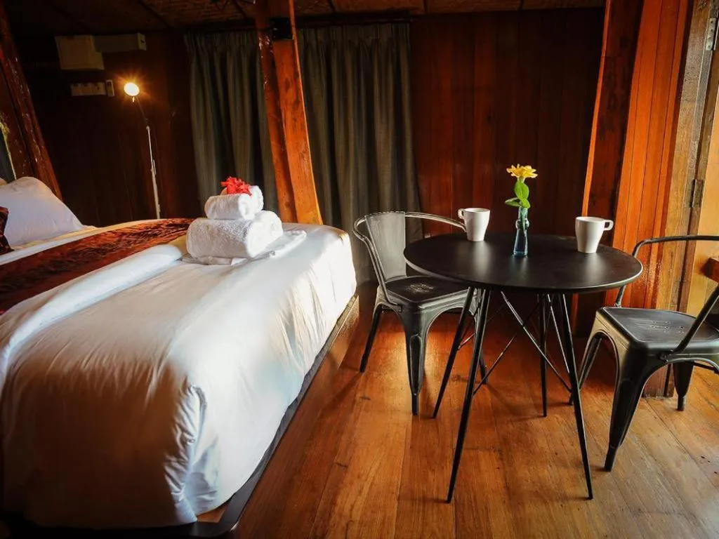 Seating area, Bed in MaliHom Private Estate