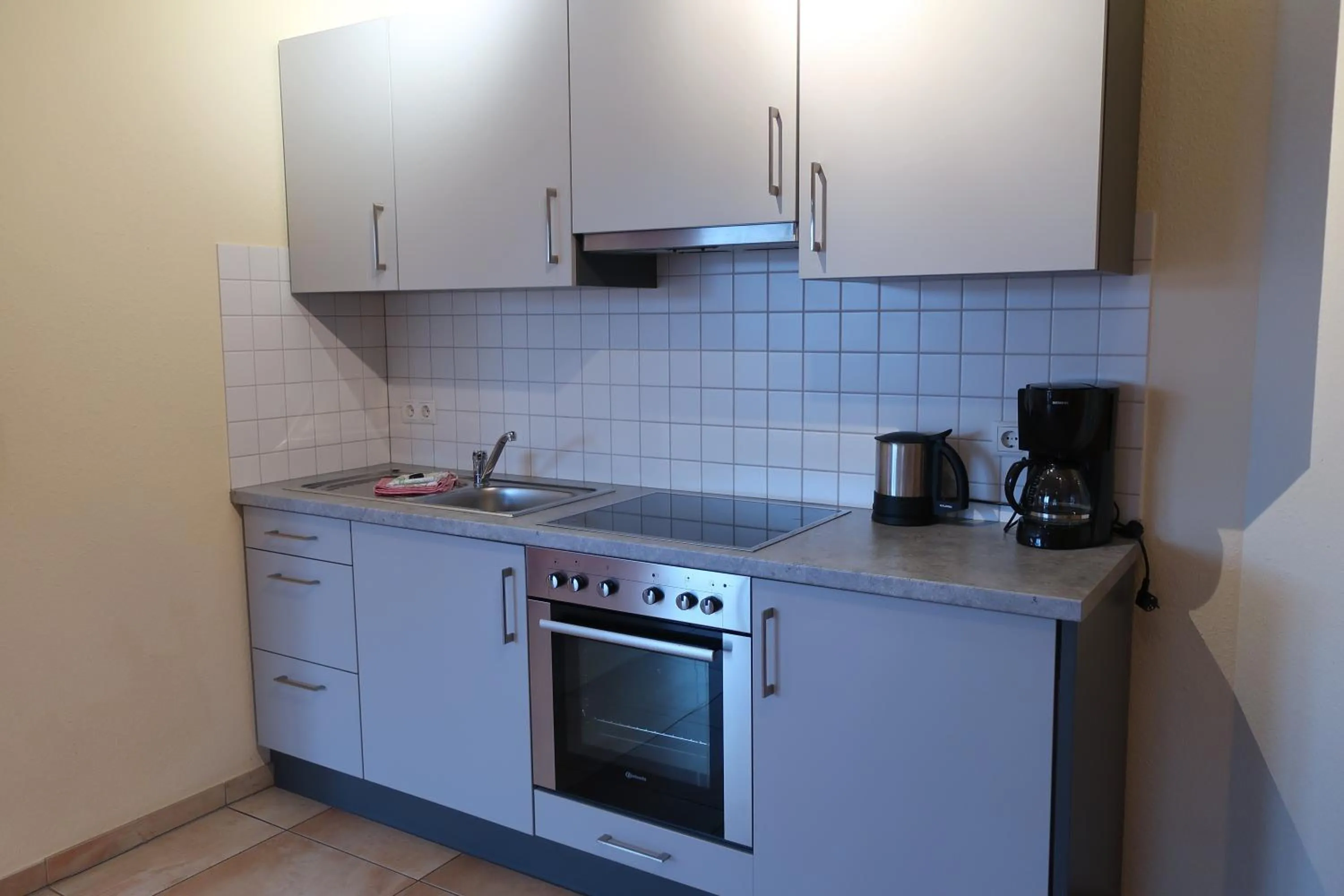 Kitchen or kitchenette in Weingut und Gästehaus Apel