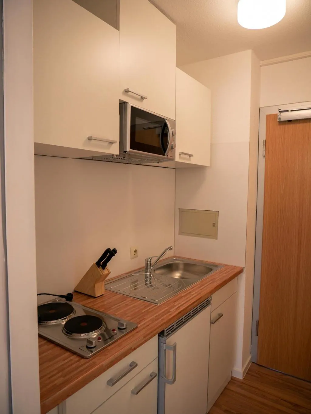 Kitchen or kitchenette in Hotel Quellenhof - Self-Check-in