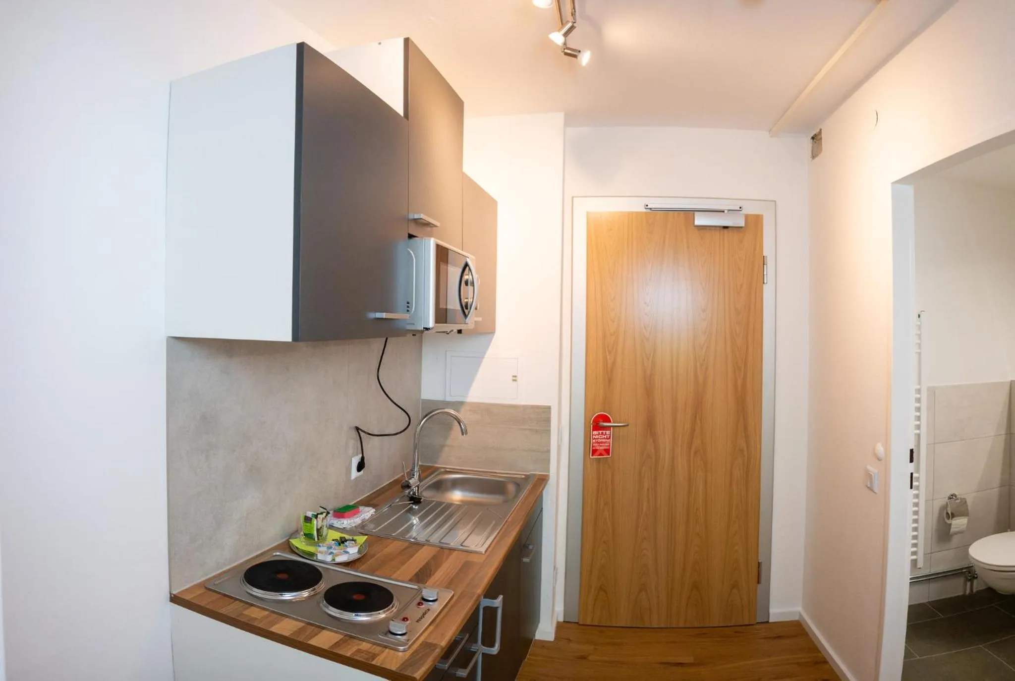 Kitchen or kitchenette in Hotel Quellenhof - Self-Check-in