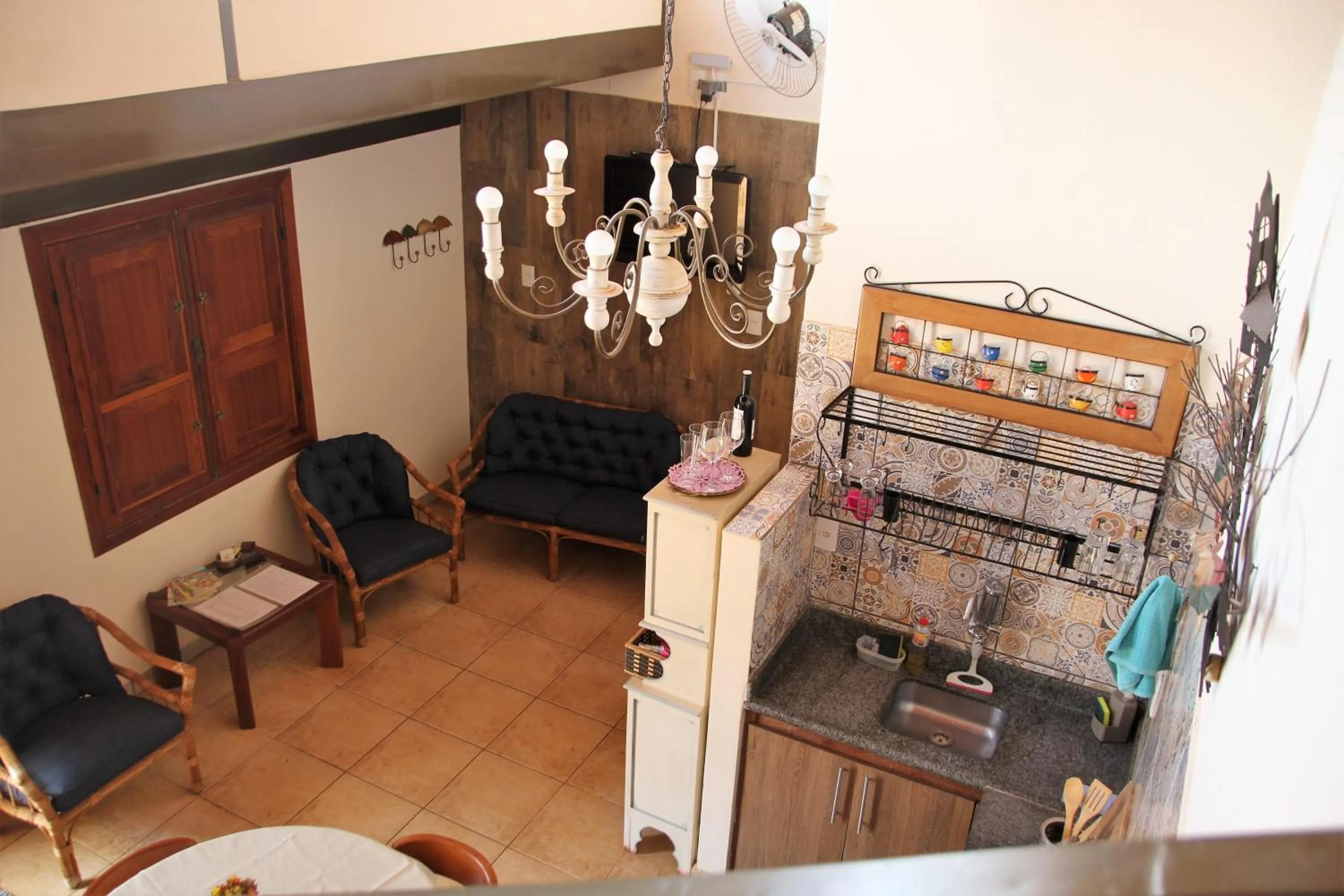 Communal lounge/ TV room in Chalé do Lago