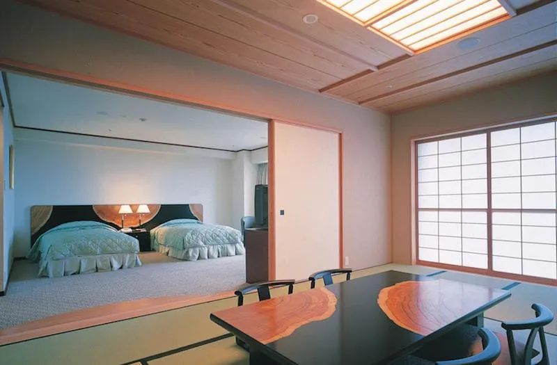 Bed in Yakushima Iwasaki Hotel