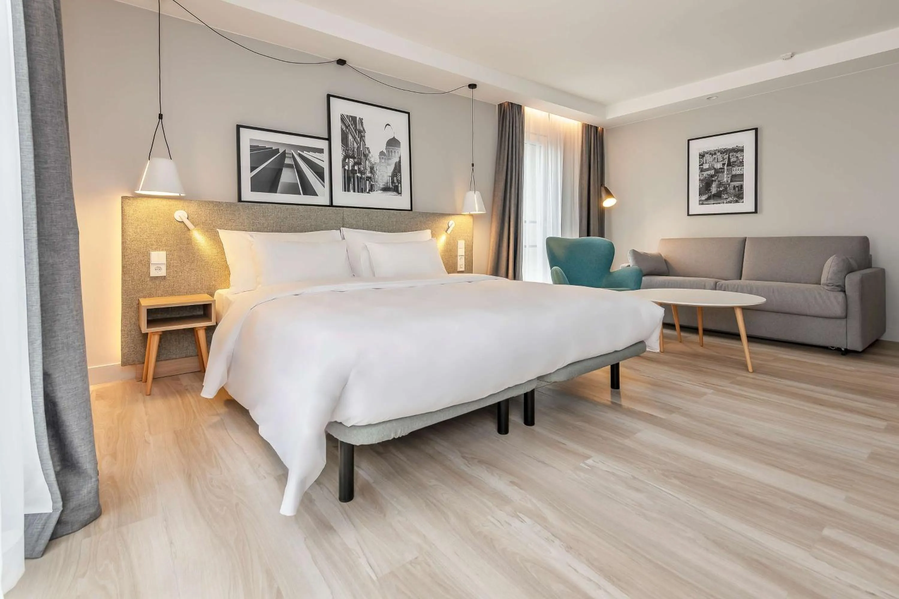 Seating area, Bed in Radisson Hotel Kaunas