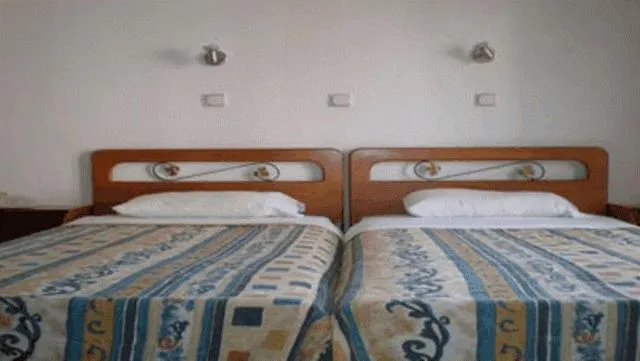 Bed in Filareti Hotel