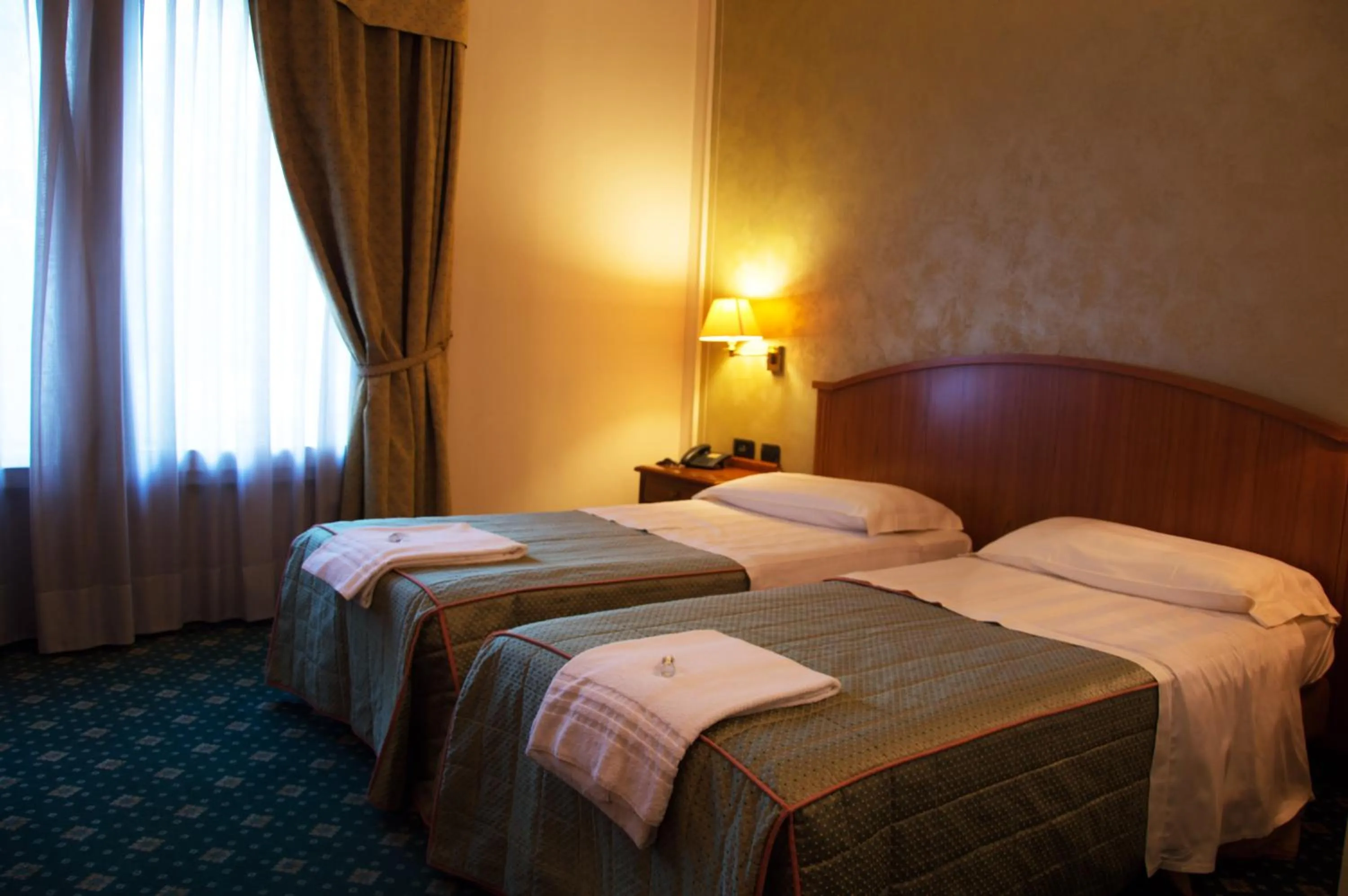 Bed in Hotel Visconti