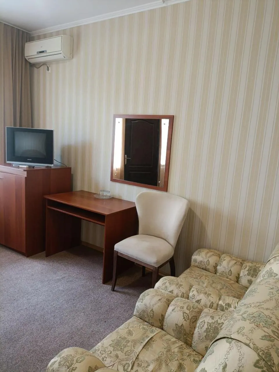Seating area, Bed in Kremin Hotel