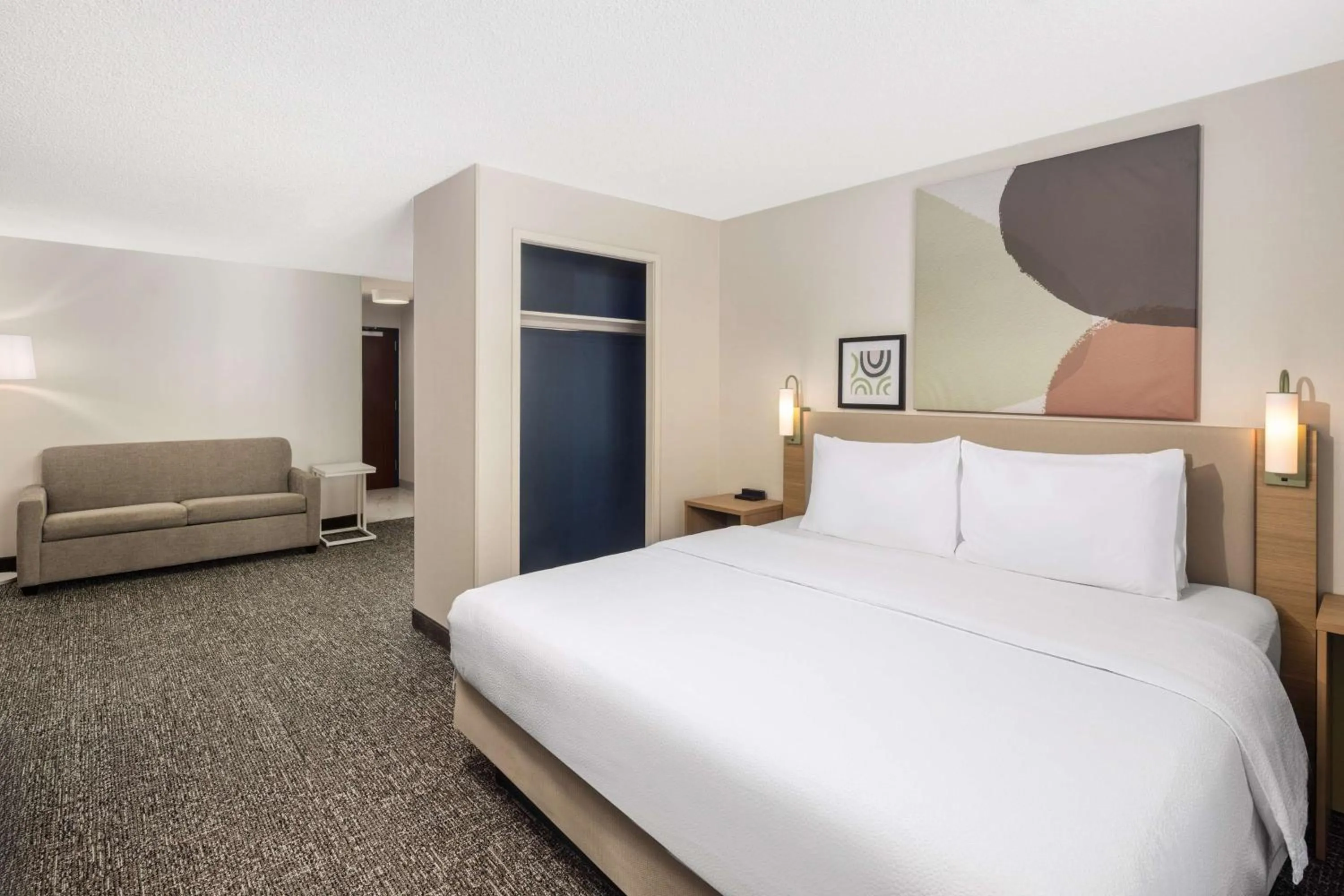 Living room, Bed in Spark by Hilton Salt Lake City Airport
