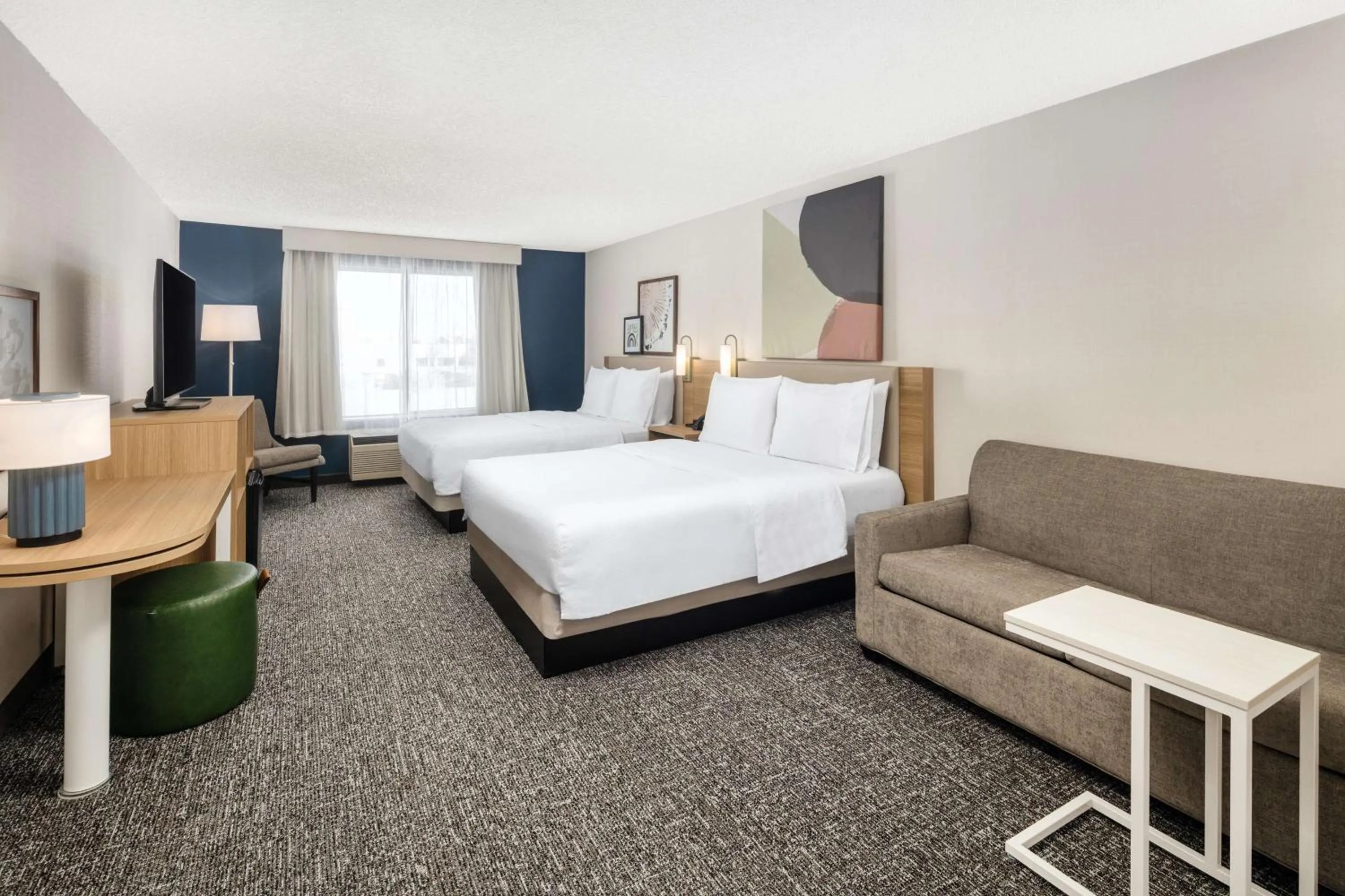 Living room, Bed in Spark by Hilton Salt Lake City Airport