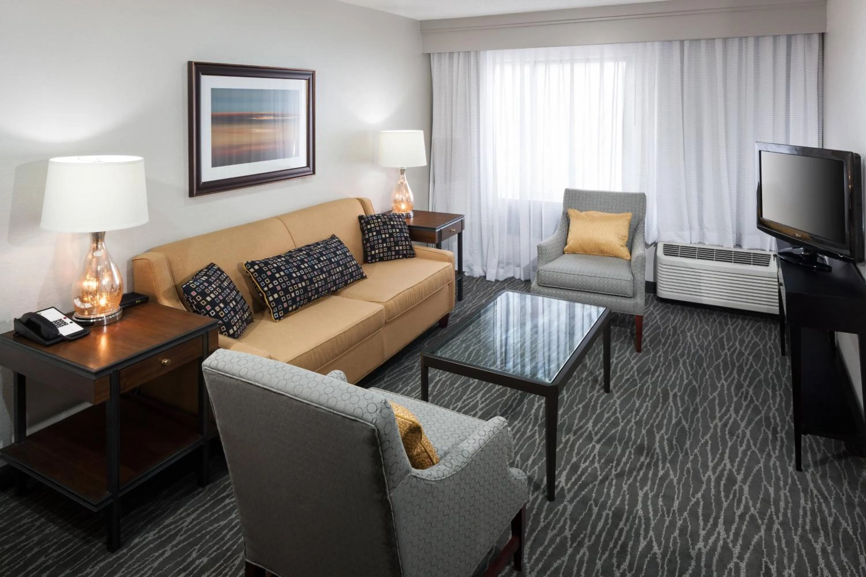 Living room in Courtyard by Marriott Waco