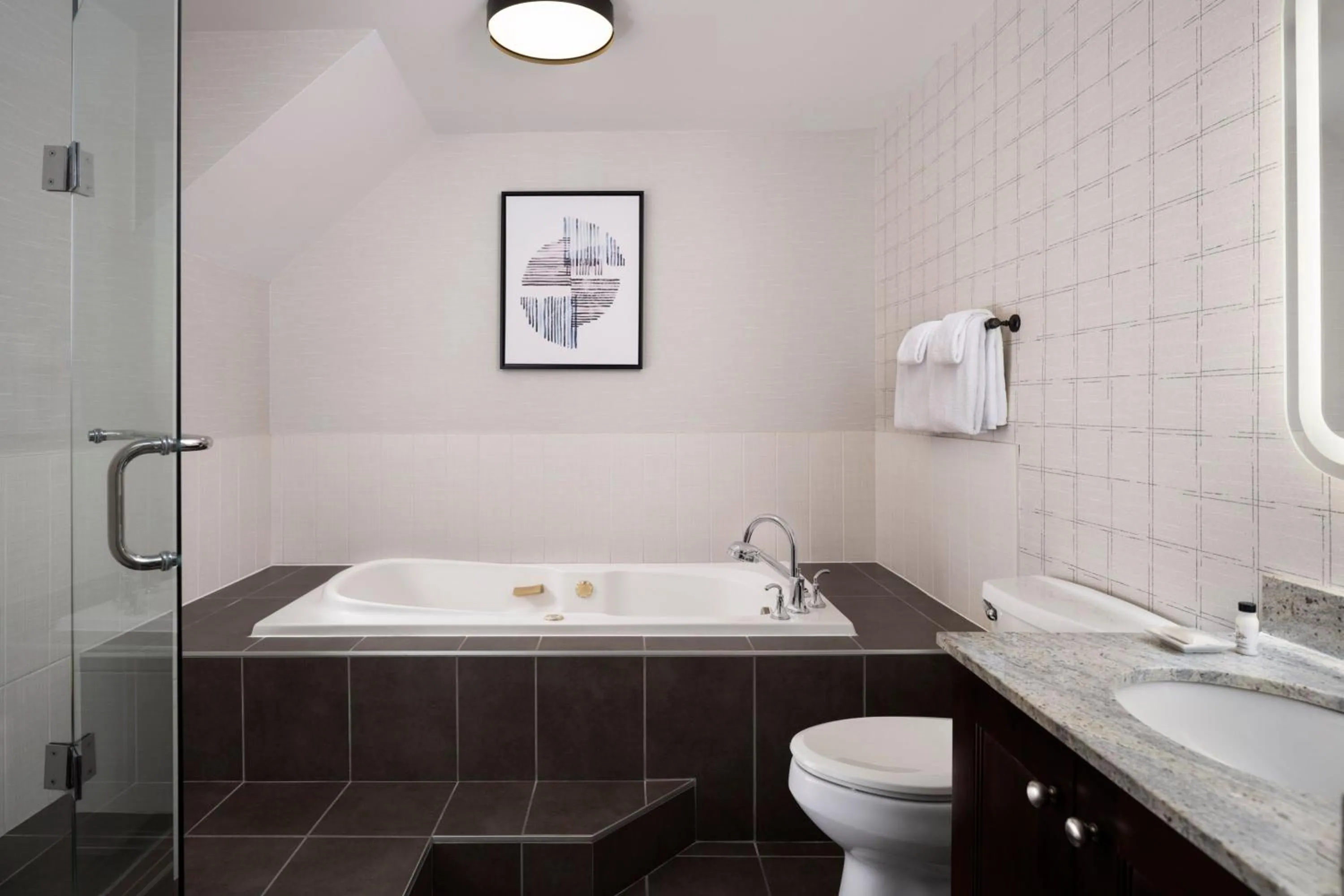 Bedroom in Delta Hotels by Marriott Grand Okanagan Resort