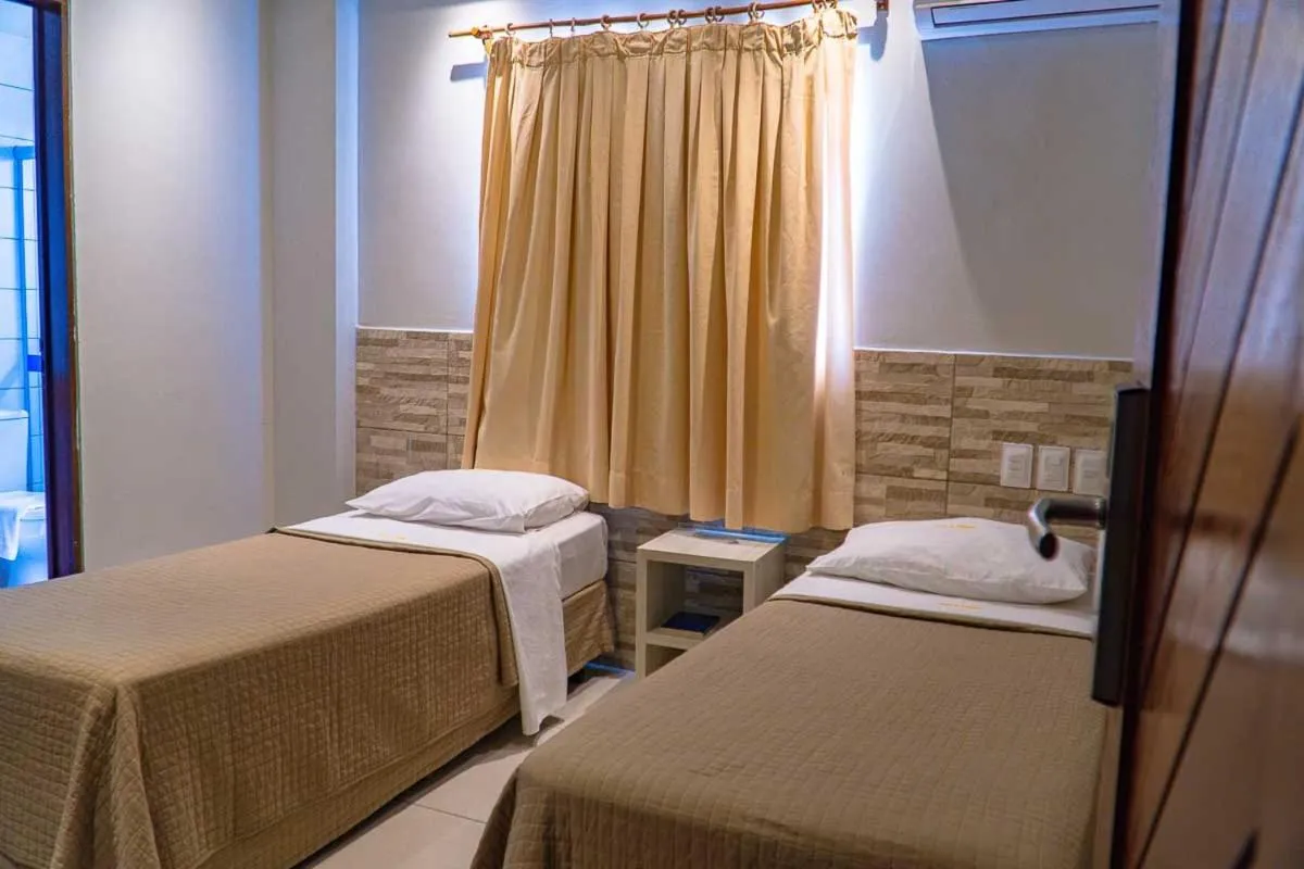 Bed in Hotel Pousada Costa do Atlântico