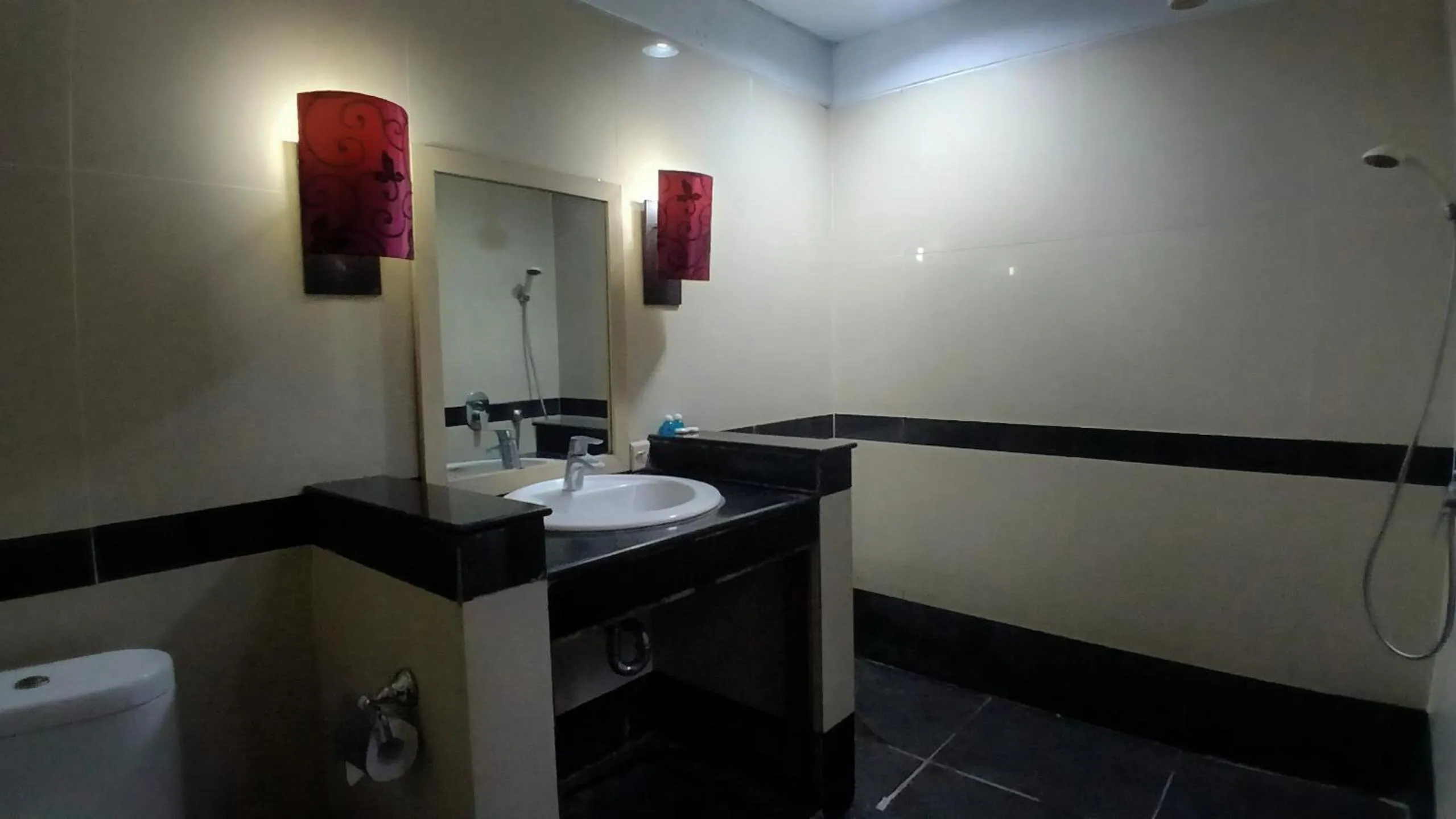 Bathroom in Nirmala Hotel & Convention Centre