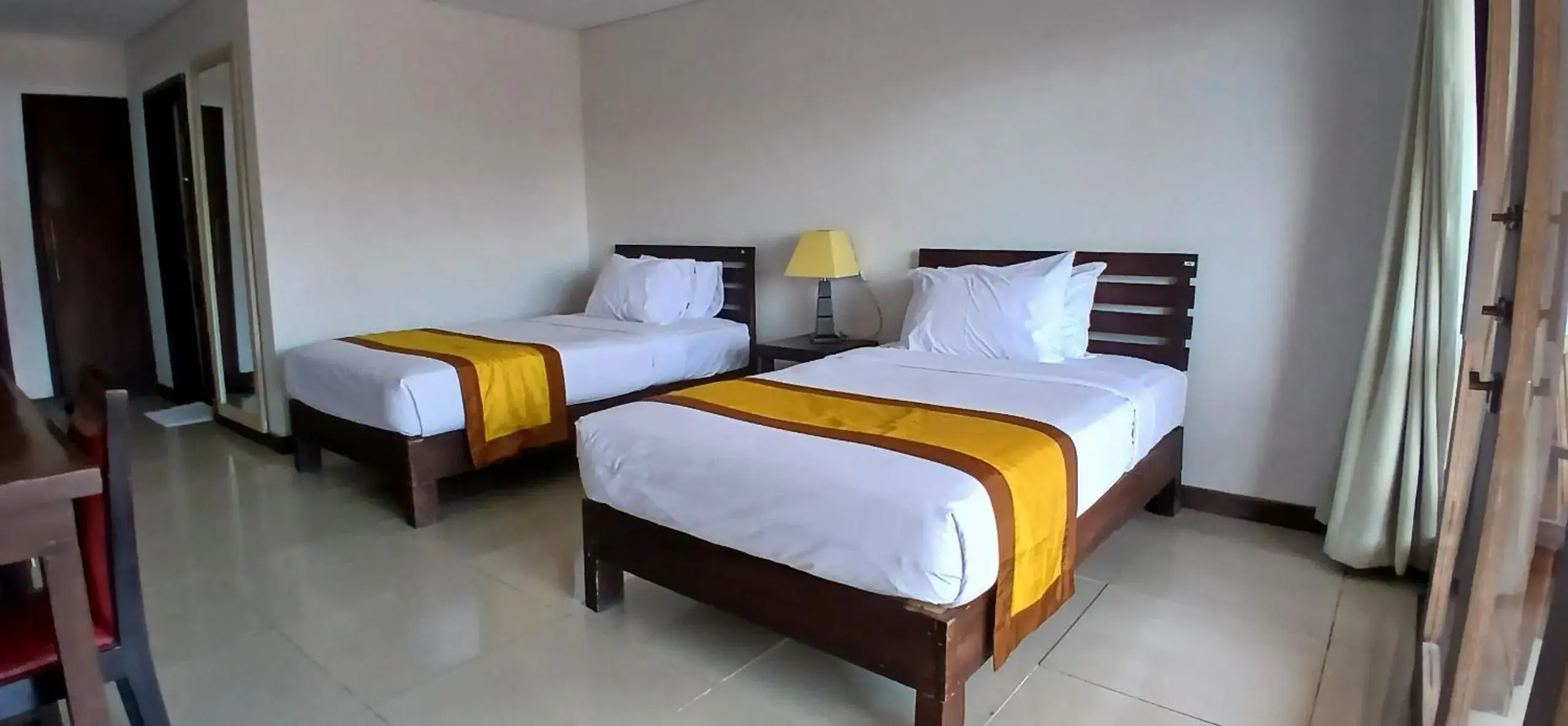 Bedroom, Bed in Nirmala Hotel & Convention Centre Bedroom, Bed in Nirmala Hotel & Convention Centre