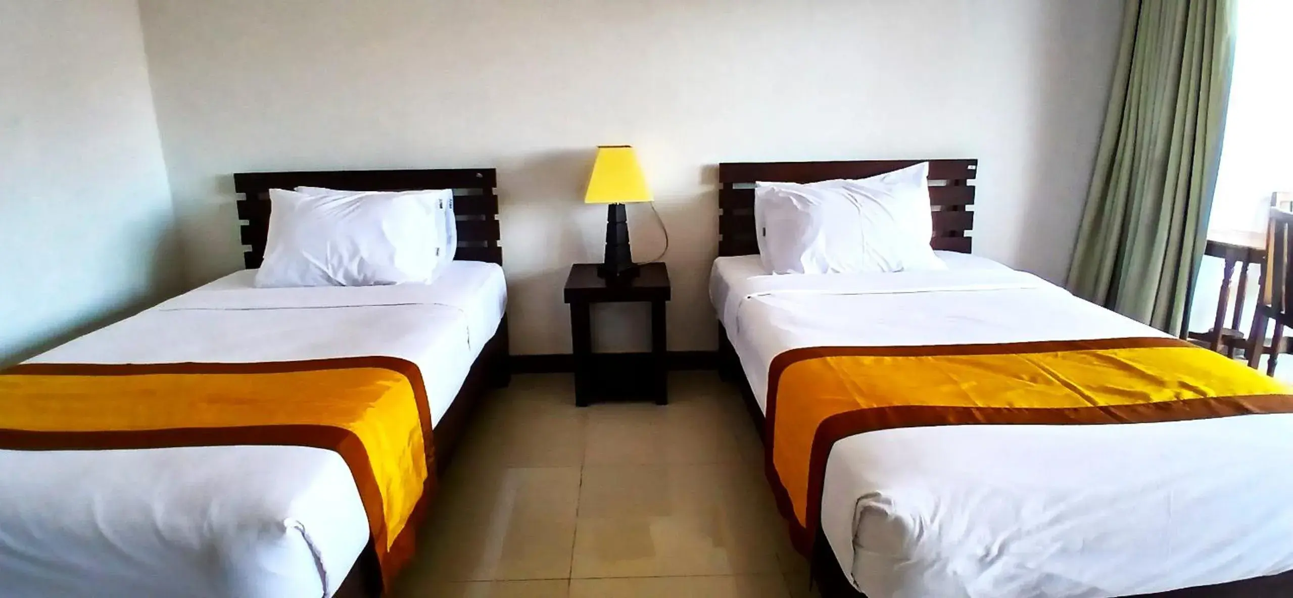 Property building, Bed in Nirmala Hotel & Convention Centre Property building, Bed in Nirmala Hotel & Convention Centre