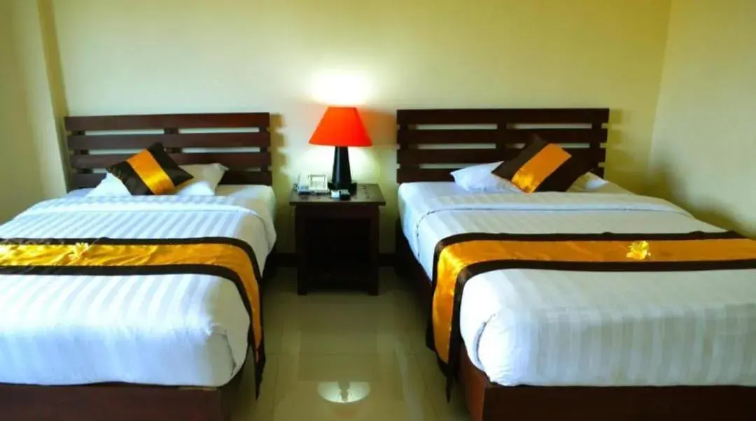 Bedroom, Bed in Nirmala Hotel & Convention Centre Bedroom, Bed in Nirmala Hotel & Convention Centre