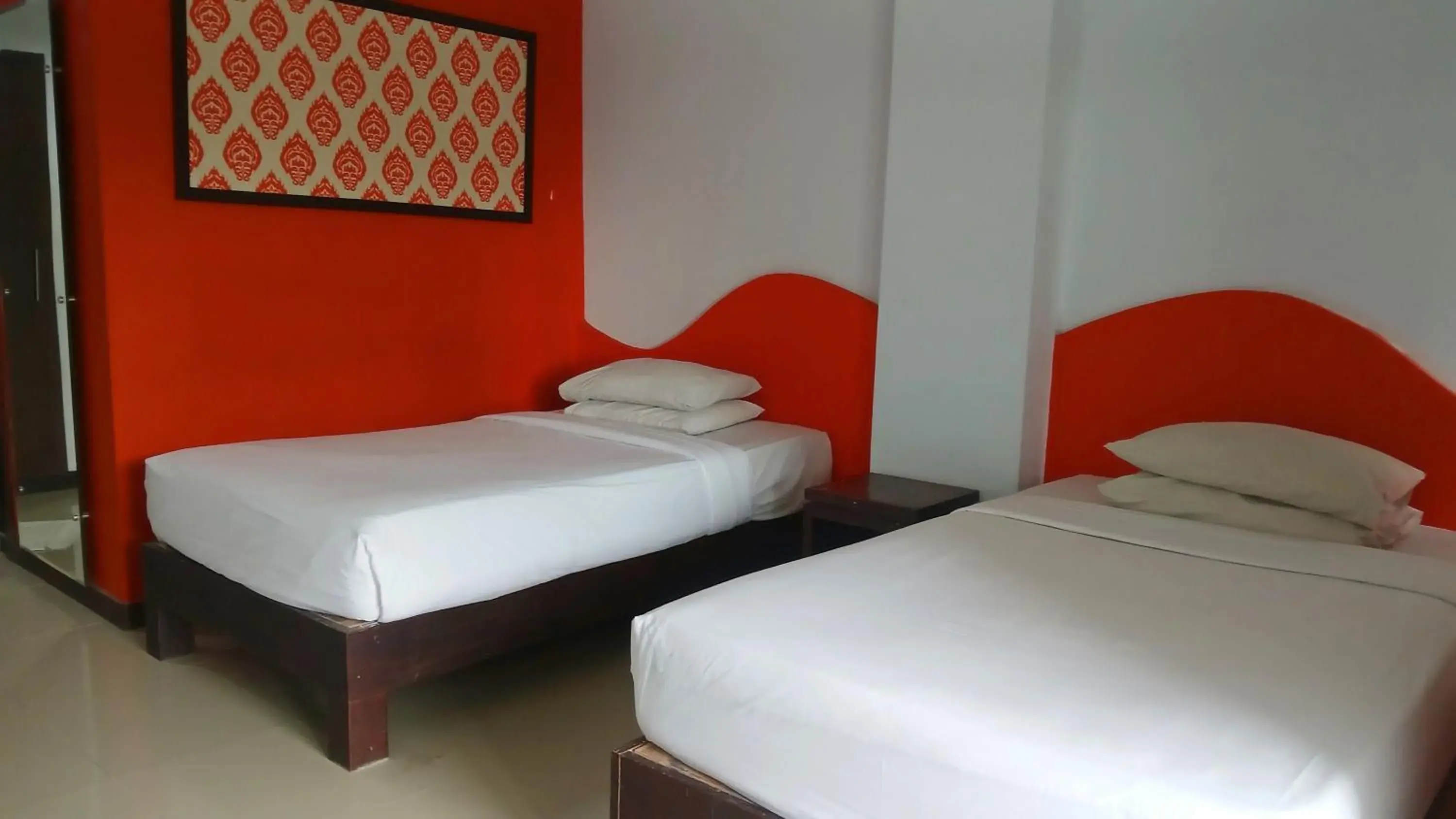 Bedroom, Bed in Nirmala Hotel & Convention Centre Bedroom, Bed in Nirmala Hotel & Convention Centre