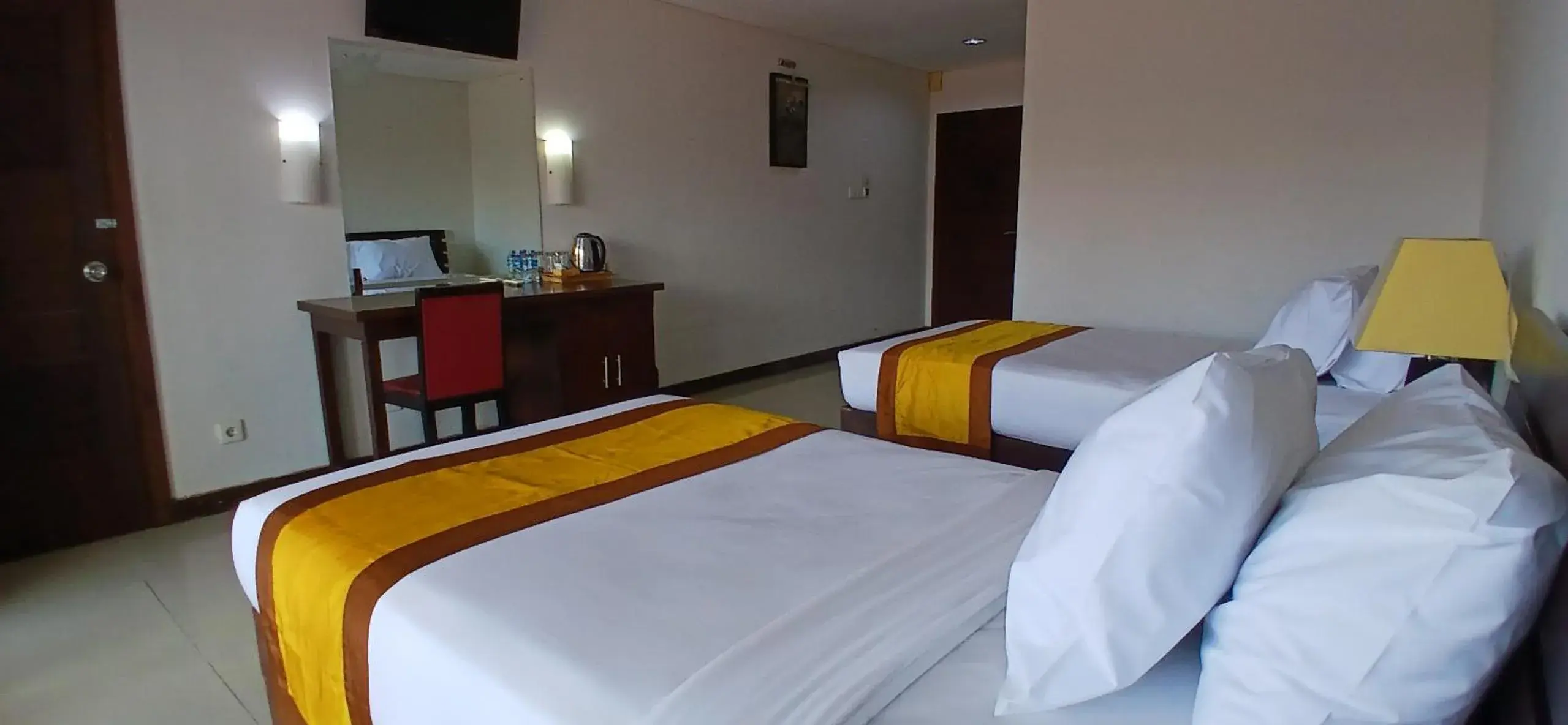 Bedroom, Bed in Nirmala Hotel & Convention Centre Bedroom, Bed in Nirmala Hotel & Convention Centre