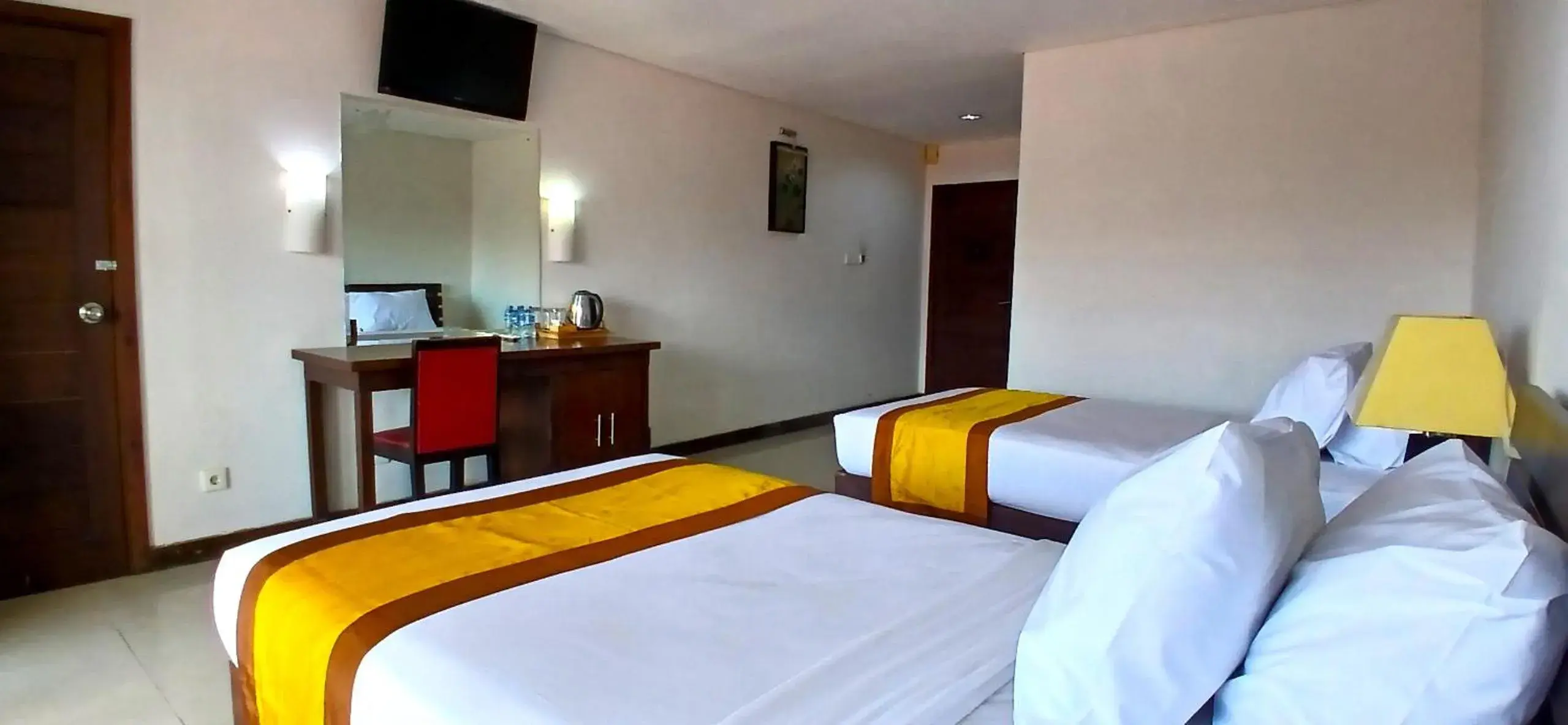 Property building, Bed in Nirmala Hotel & Convention Centre Property building, Bed in Nirmala Hotel & Convention Centre
