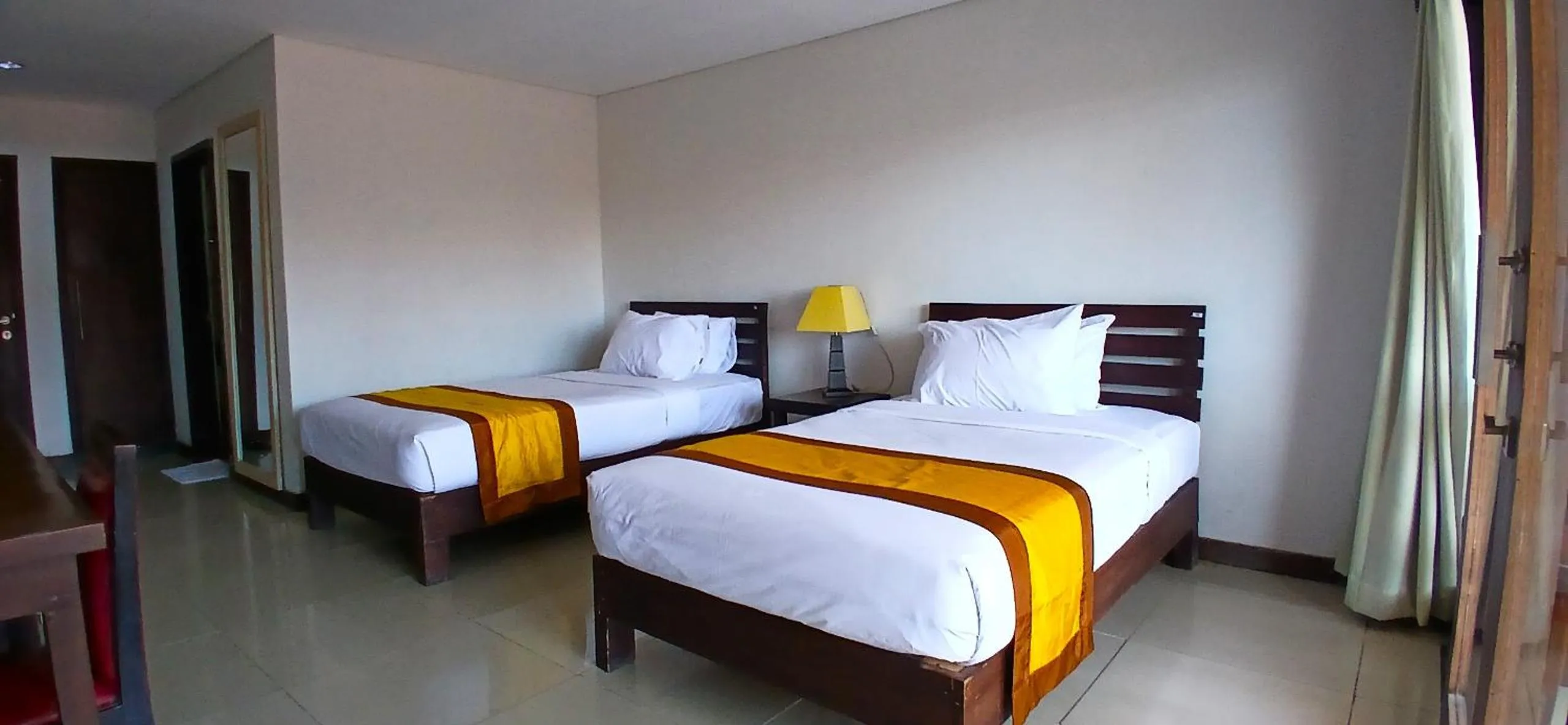 Property building, Bed in Nirmala Hotel & Convention Centre