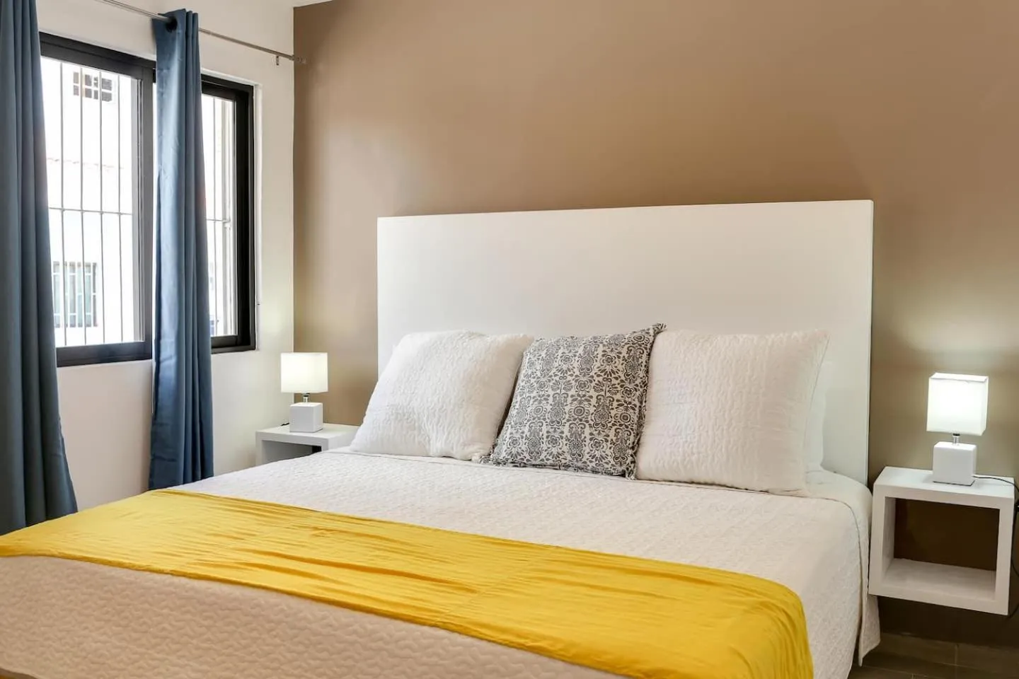 Bed in Valentina Suites by Las Flores Vacation Rentals