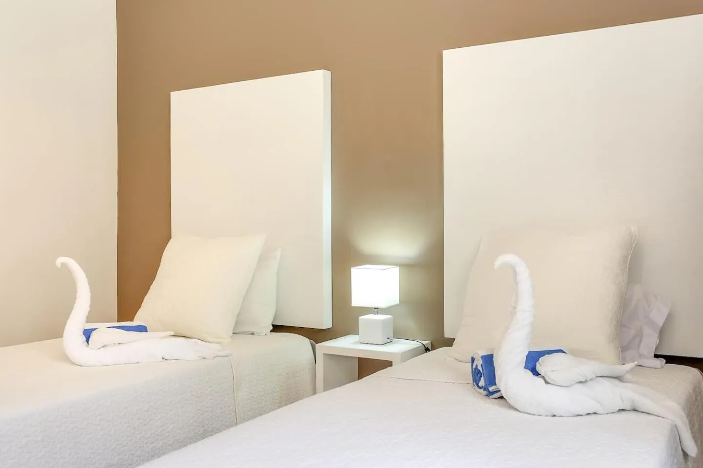 Bed in Valentina Suites by Las Flores Vacation Rentals