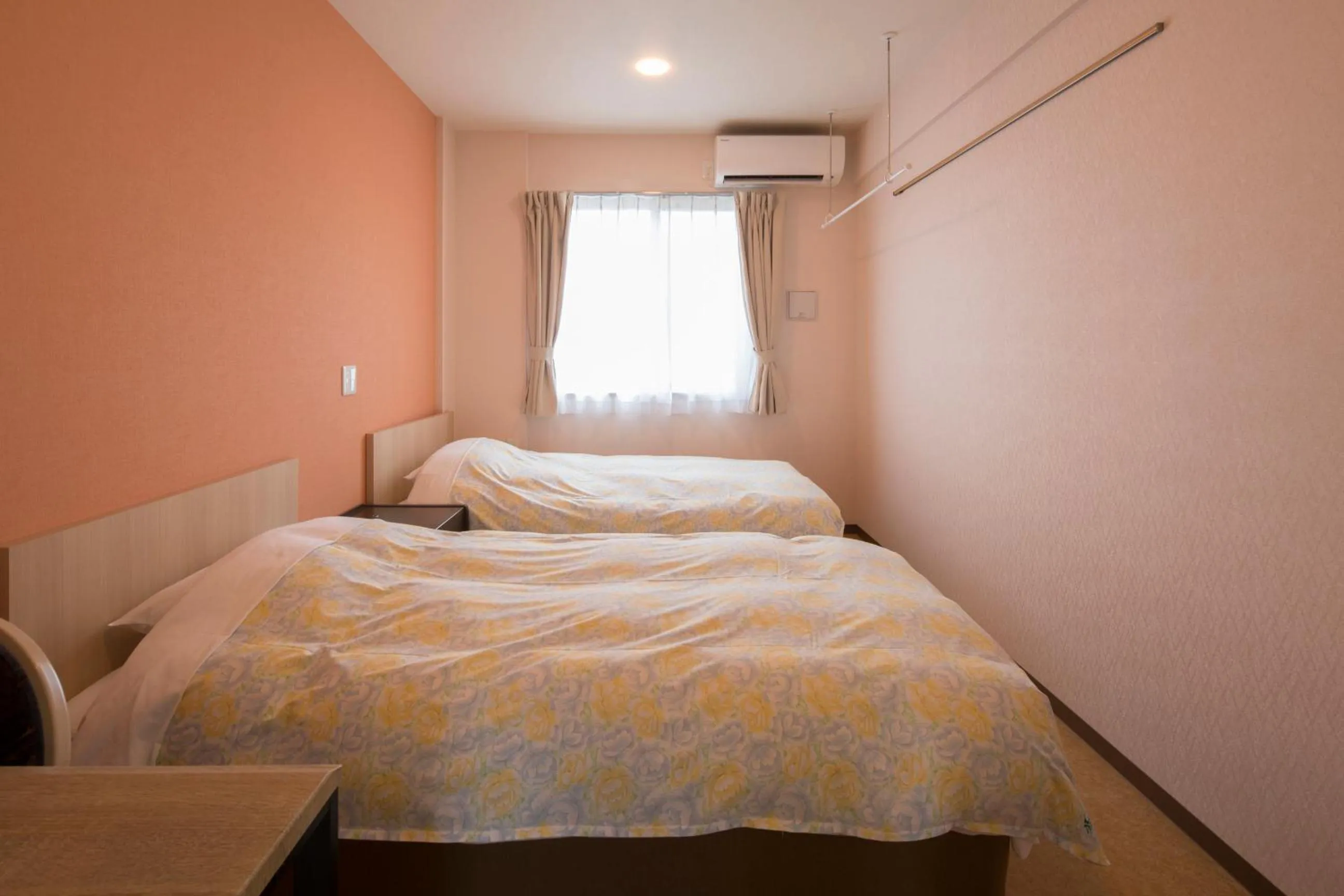 Bed in Hotel Asahi Grandeur Fuchu