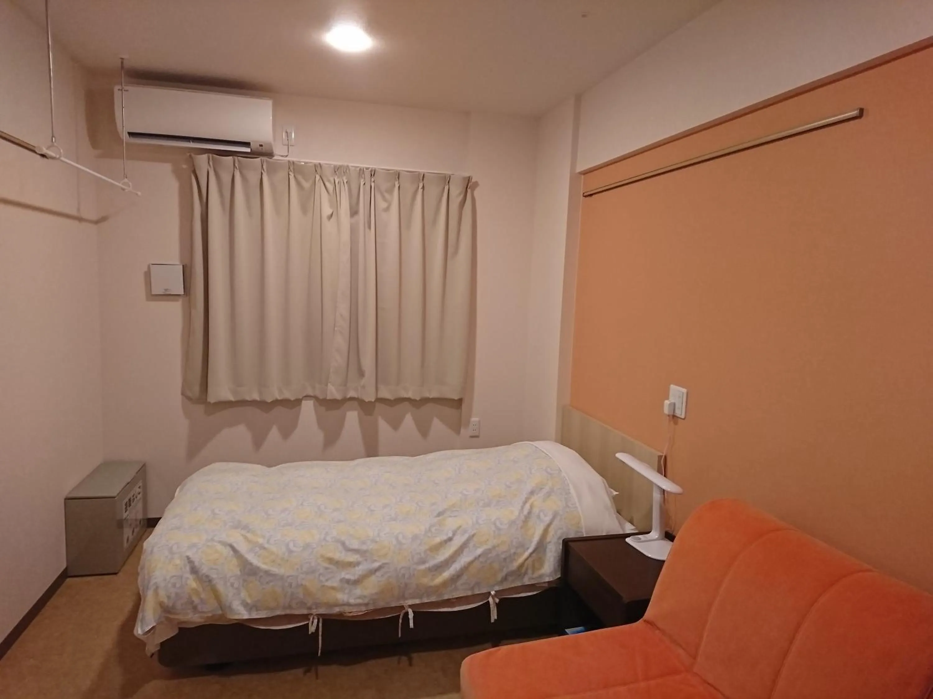 Bed in Hotel Asahi Grandeur Fuchu