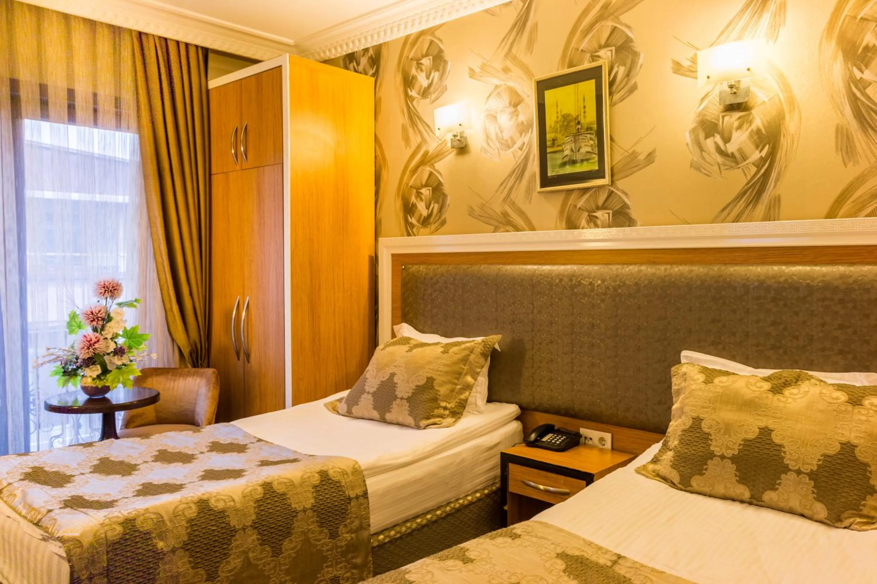 Bed in Grand Rosa Hotel