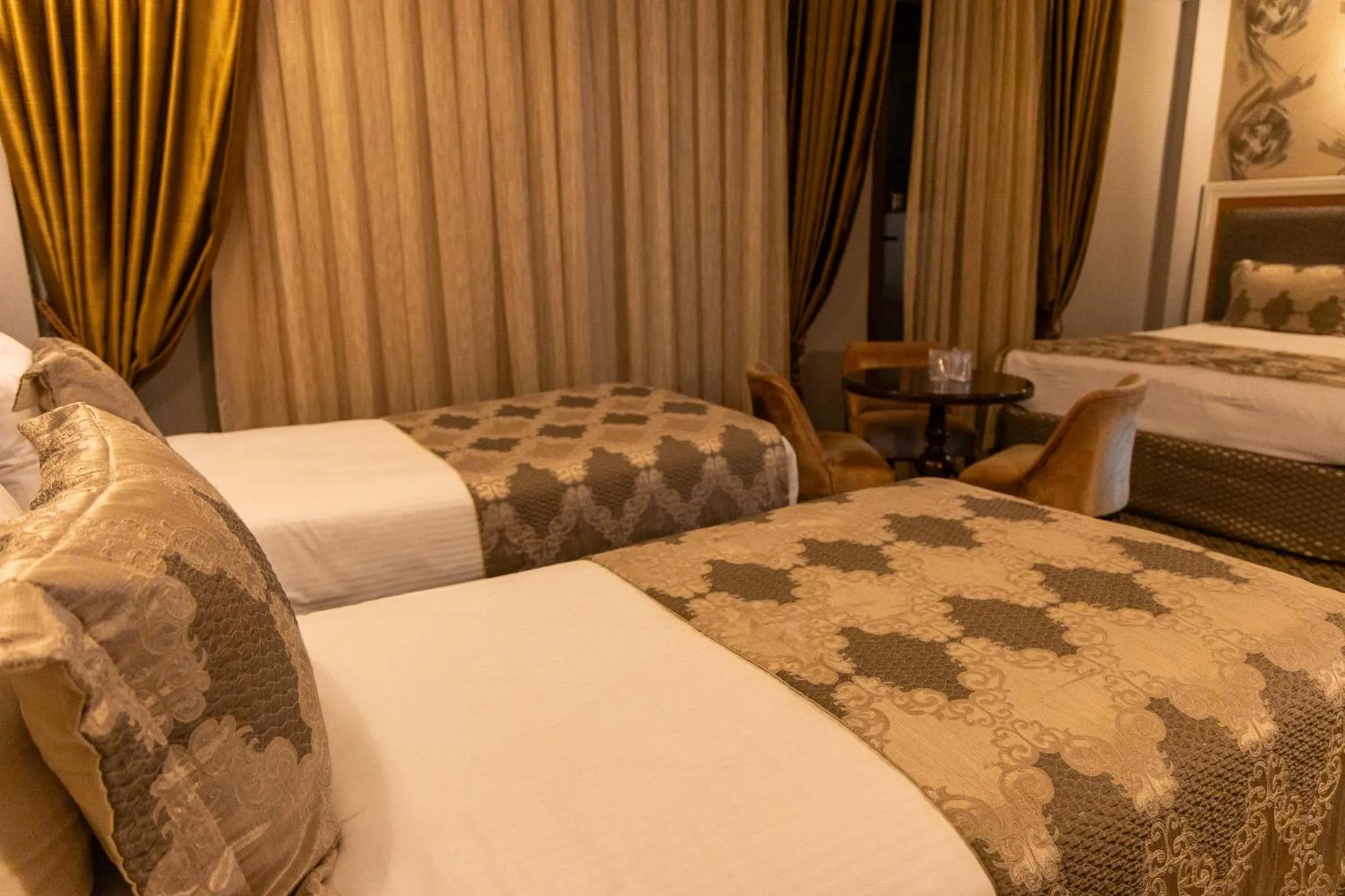 Bed in Grand Rosa Hotel