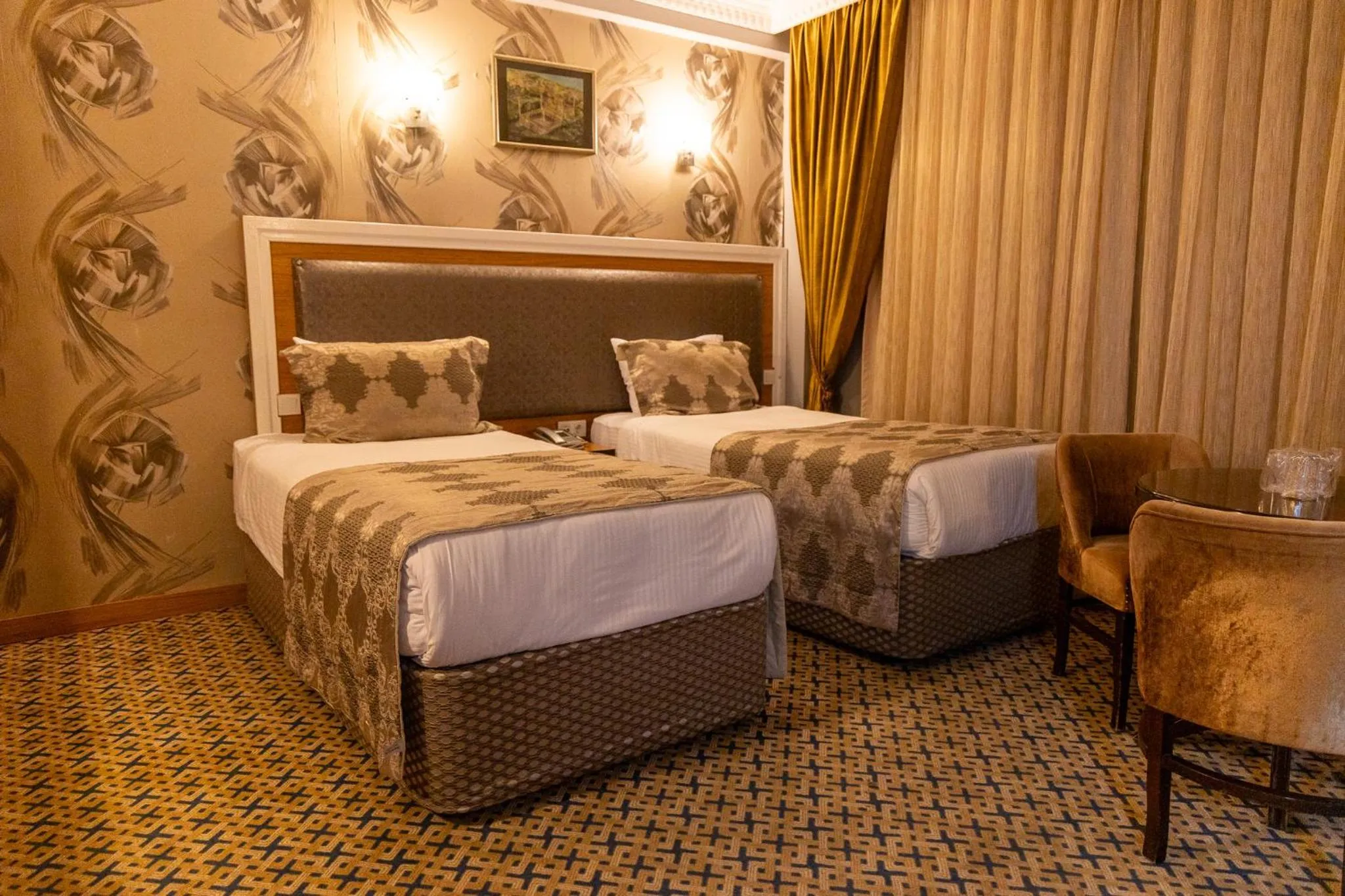 Bed in Grand Rosa Hotel