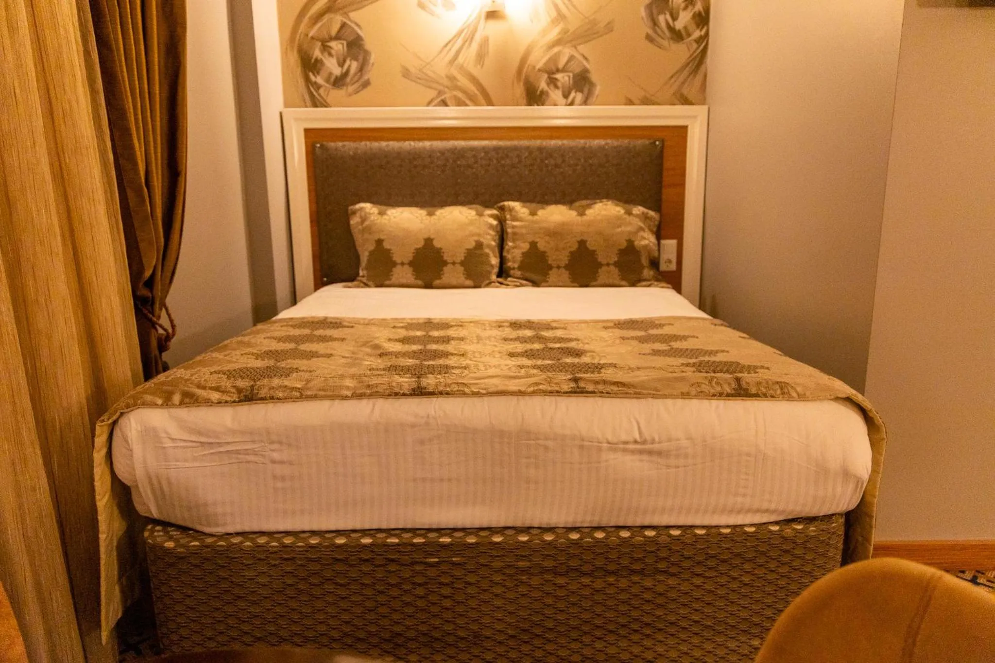 Bed in Grand Rosa Hotel