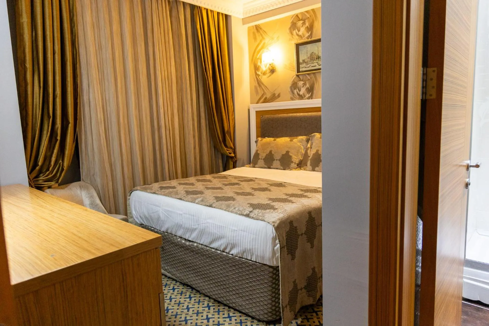 Bed in Grand Rosa Hotel